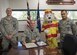 (From the left) Staff Sgt. Tyler Ford, 366th Civil Engineer Squadron firefighter; Col. Jefferson O’Donnell, 366th Fighter Wing commander; Sparky the Dog; and Staff Sgt. Francis Abac, 366th CES firefighter, gather to proclaim Fire Prevention Week at Mountain Home Air Force Base, Idaho, Oct. 7, 2016. National Fire Prevention Week was created in 1925 by president Calvin Coolidge to help prevent fire deaths and memorialize the Chicago Fire of 1871 which killed more than 250 people. (U.S. Air Force photo by Airman 1st Class Chester Mientkiewicz/Released)