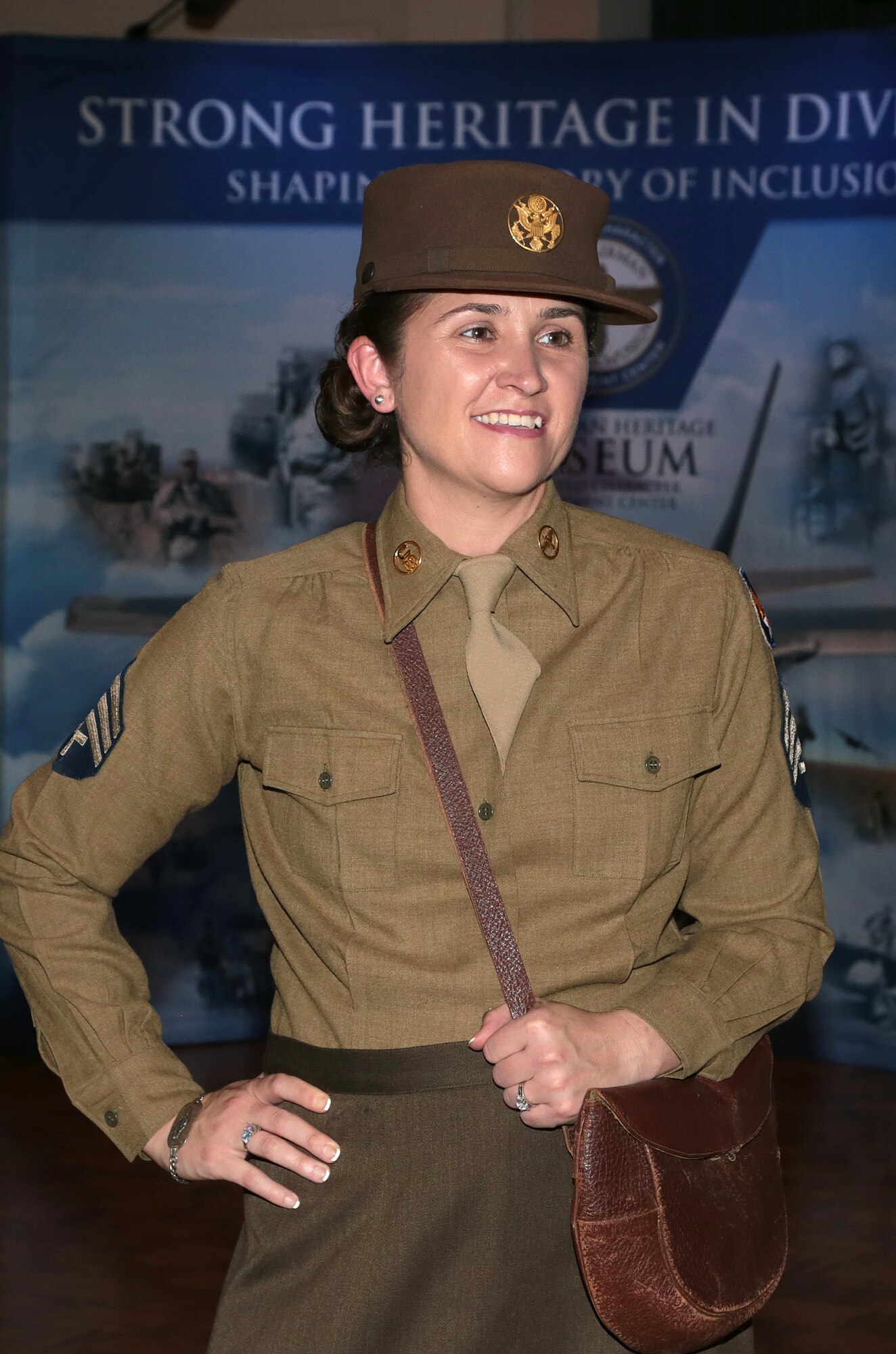 An Airman models one of the first uniforms designated for women who joined the Air Force in 1948 during a living history fashion show Oct. 7, 2016, at Joint Base San Antonio-Lackland’s Gateway Club. JBSA-Lackland hosted a reunion of the Women in the Air Force, a term for women who joined the Air Force between the years of 1949-1976. The WAF was founded in 1948 out of the Women’s Armed Service Integration Act, which enabled tens of thousands of female service members to find jobs in the Air Force. In 1976 women were accepted into the service on an equal basis with men. 