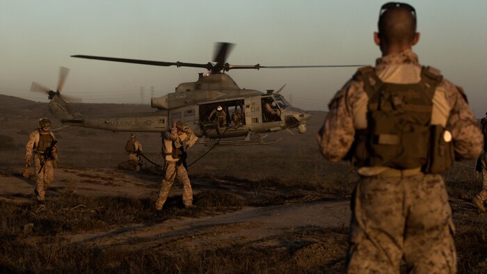 A UH-1Y Huey with Marine Light Attack Helicopter Squadron 369 prepares to land after Marines with 1st Reconnaissance Battalion, 1st Marine Division, finished a fast-rope drill at Marine Corps Base Camp Pendleton, California, Oct. 6, 2016. The fast-rope training was part of a larger event called a Marine Air-Ground Task Force integration exercise, which enabled air and ground units to come together and cooperate in various training missions prior to their deployment with the 15th Marine Expeditionary Unit. 