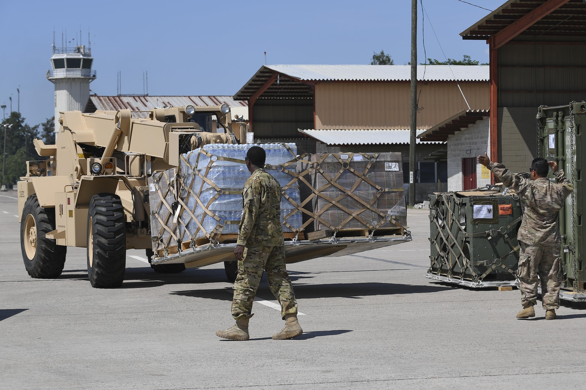 Members of Joint Task Force-Bravo stage supplies at Soto Cano Air Base, Honduras, Oct. 6, 2016, prior to loading onto an aircraft headed to Haiti to support the ongoing Hurricane Matthew disaster relief efforts. As nine helicopters assigned to Special Purpose Marine Air-Ground Task Force-Southern Command and JTF-Bravo deployed Oct. 4 and 5 with personnel and supplies, multiple mobility aircraft followed picking up pallets from Soto Cano AB to sustain Hurricane Matthew disaster relief operations in Haiti.