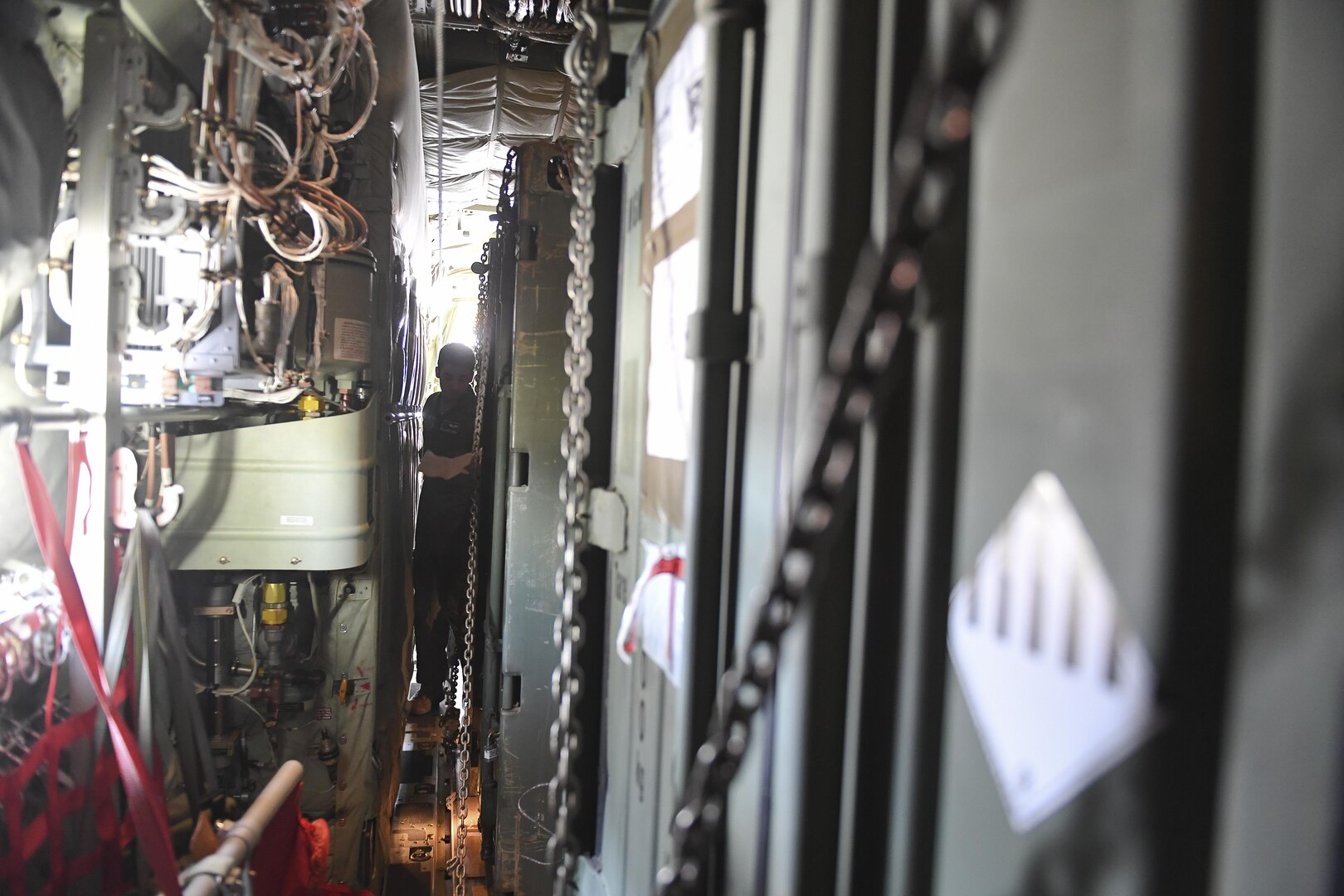 An aircrew member from Dyess Air Force Base, Texas takes inventory of cargo onboard a C-130J Hercules at Soto Cano Air Base, Honduras, Oct. 7, 2016, that was headed to Haiti to provide needed sustainment equipment for use by Joint Task Force Matthew. Extensive joint planning between Special Purpose Marine Air-Ground Task Force-Southern Command and Joint Task Force-Bravo logistics personnel was required to establish load plans and cargo prioritization so the equipment would be ready to load and transport without delay to prevent any mission stoppages or shortfalls.