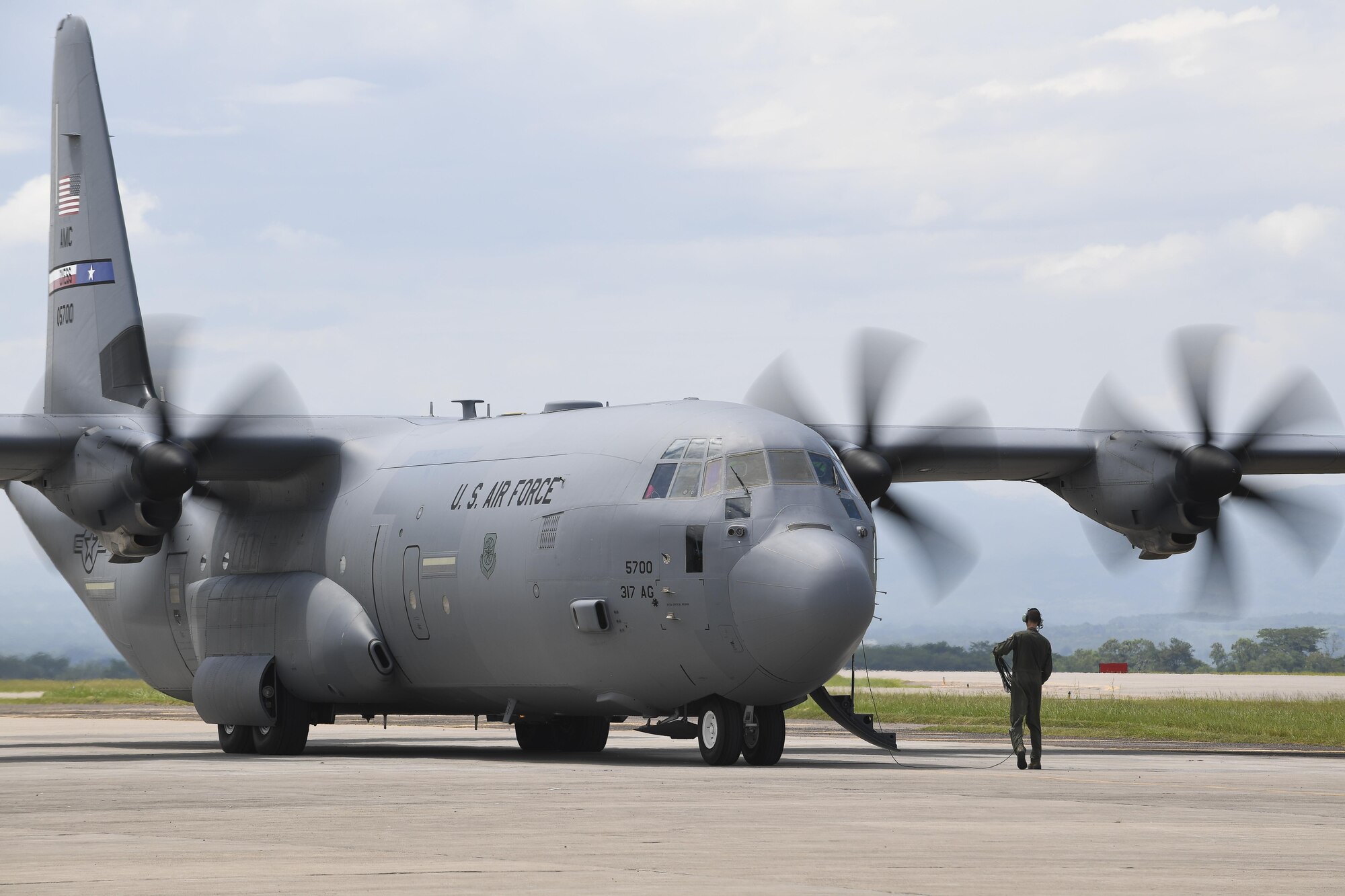 A C-130J Hercules from Dyess Air Force Base, Texas, goes through pre-flight checks at Soto Cano Air Base, Honduras, prior to deploying to Port-au-Prince, Haiti, to support the ongoing Hurricane Matthew disaster relief efforts. This cargo aircraft deployed to Soto Cano AB within hours of being requested to transport additional personnel and equipment necessary to sustain flight and maintenance operations in Haiti.