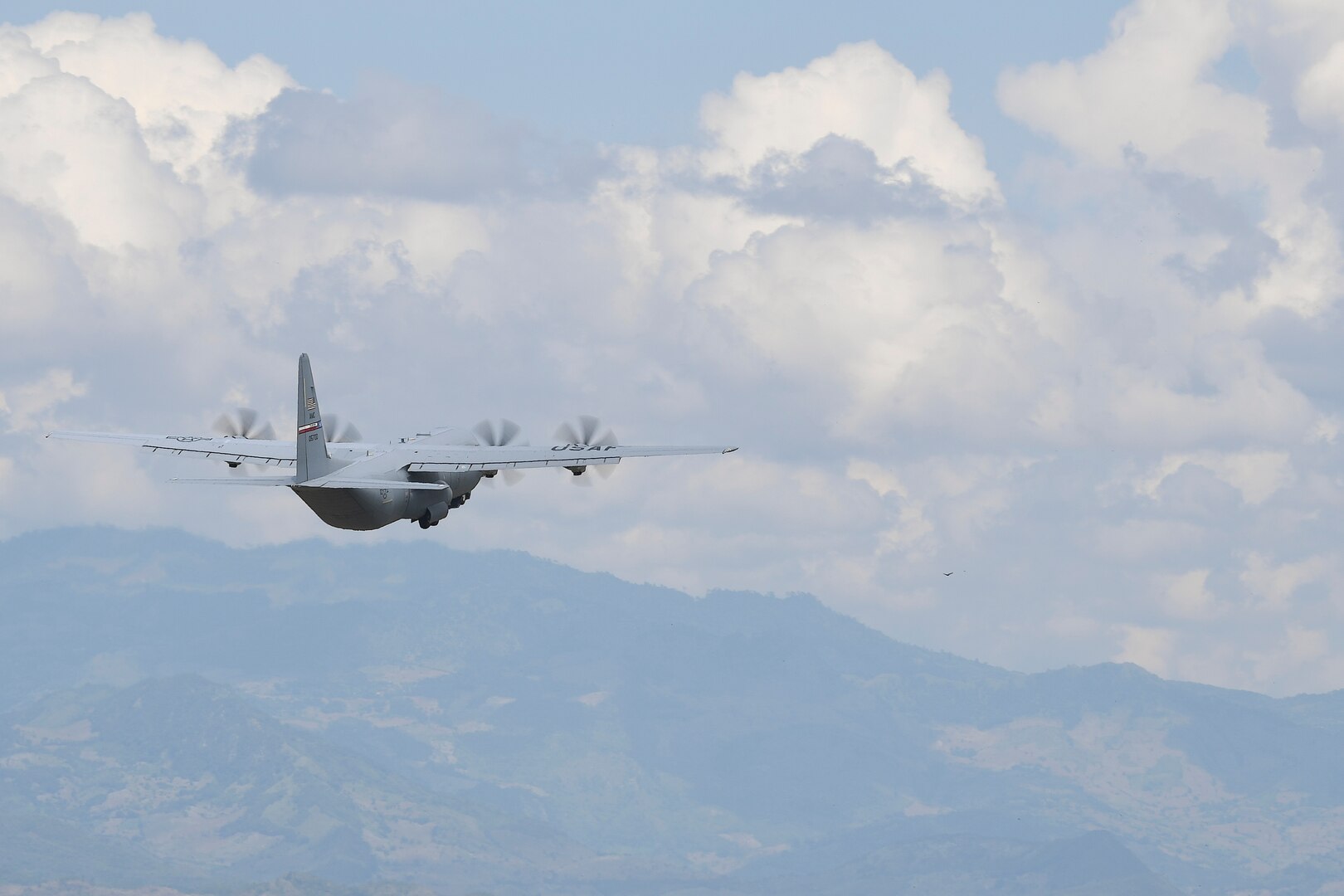 A C-130 Hercules from Dyess Air Force Base, Texas, takes flight from Soto Cano Air Base, Honduras, headed towards Haiti to support the ongoing Hurricane Matthew disaster relief efforts Oct. 7, 2016. At the request of U.S. Southern Command, U.S. Transportation Command directed C-17 Globemaster III and C-130 cargo aircraft to Soto Cano AB to move critical supplies and personnel to Haiti where approximately 200 Soldiers, Airmen and Marines from Special Purpose Marine Air-Ground Task Force-Southern Command and Joint Task Force-Bravo deployed this week with two CH-53E Super Stallion, three CH-47 Chinook, and two UH-60L and two HH-60L Black Hawk helicopters to provide heavy and medium lift to support the U.S. Agency for International Development-led mission.