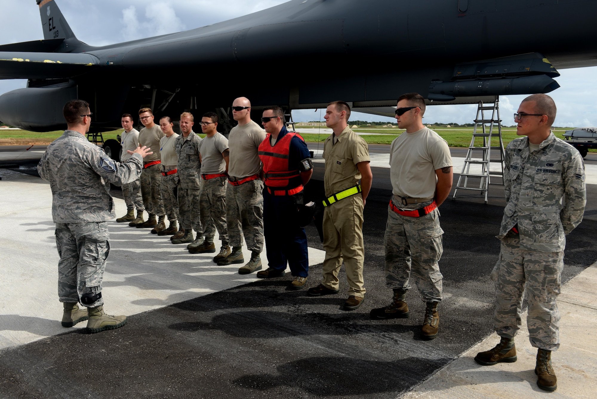 Senior Master Sgt. Christopher Shaver, 36th Wing weapons manager, briefs load crews before a loading exercise Sept. 29, 2016, at Andersen Air Force Base, Guam. LOADEX is a weapons loading exercise where Airmen fine-tune their loading capabilities monthly. The B-1B Lancer aircrews are currently deployed here in support of the Pacific Command’s Continuous Bomber Presence mission. (U.S. Air Force photo by Airman 1st Class Alexa Ann Henderson)