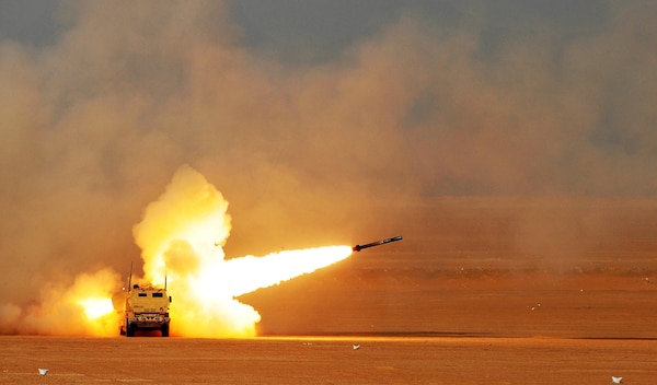 Soldiers of Alpha Company, 1st Battalion, 94th Field Artillery Regiment, fire a rocket from a M142 high mobility rocket system during a decisive action training environment exercise on Oct. 4, 2016 near Camp Buehring, Kuwait. The unit certified four HIMARS operator crews as well as a contingent of forward observers during the exercise (U.S. Army photo by Sgt. Aaron Ellerman)