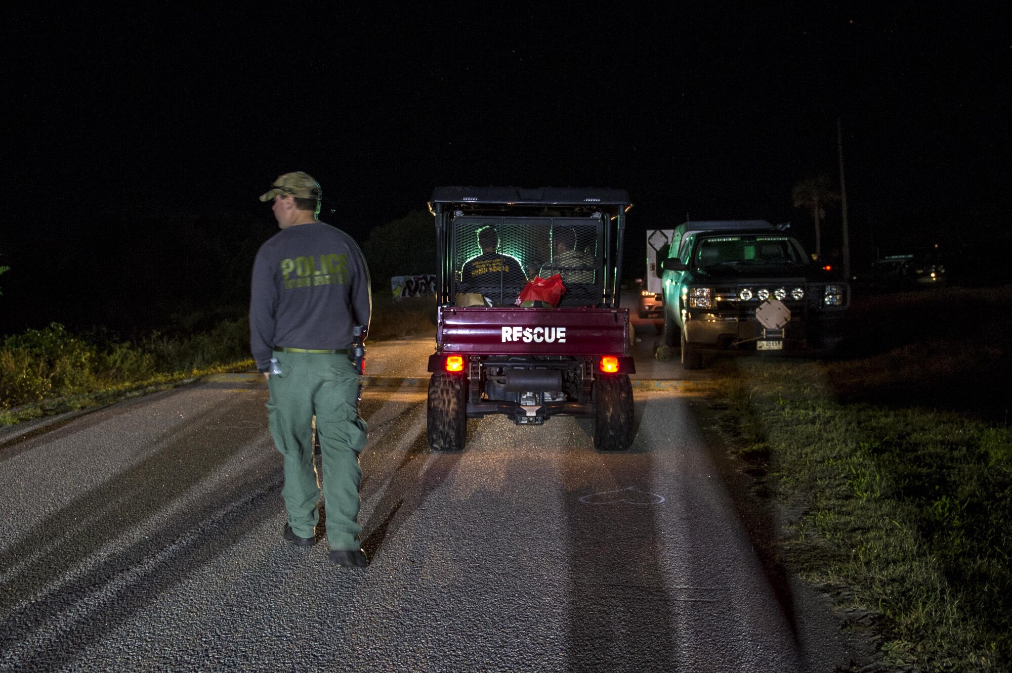 U.S. Air Force Explosive Ordnance Disposal technicians work with local law enforcement bomb squad members to transport Civil War cannonballs washed ashore from  Hurricane Matthew to a safe location at Folly Beach, S.C., Oct. 9, 2016. After the discovery of ordnance on the beach, local law enforcement and Air Force personnel worked together to properly dispose of the hazards. 