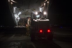U.S. Air Force C-17 Globemaster III crewmembers load cargo during a transport mission in support of Operation Freedom Sentinel in Southwest Asia Sept. 30, 2016. The C-17 is the newest most flexible cargo aircraft to enter the airlift force. The C-17 is capable of rapid strategic delivery of troops and all types of cargo to main operating bases or directly to forward bases in the deployment area. (U.S. Air Force photo by Staff Sgt. Douglas Ellis/Released)