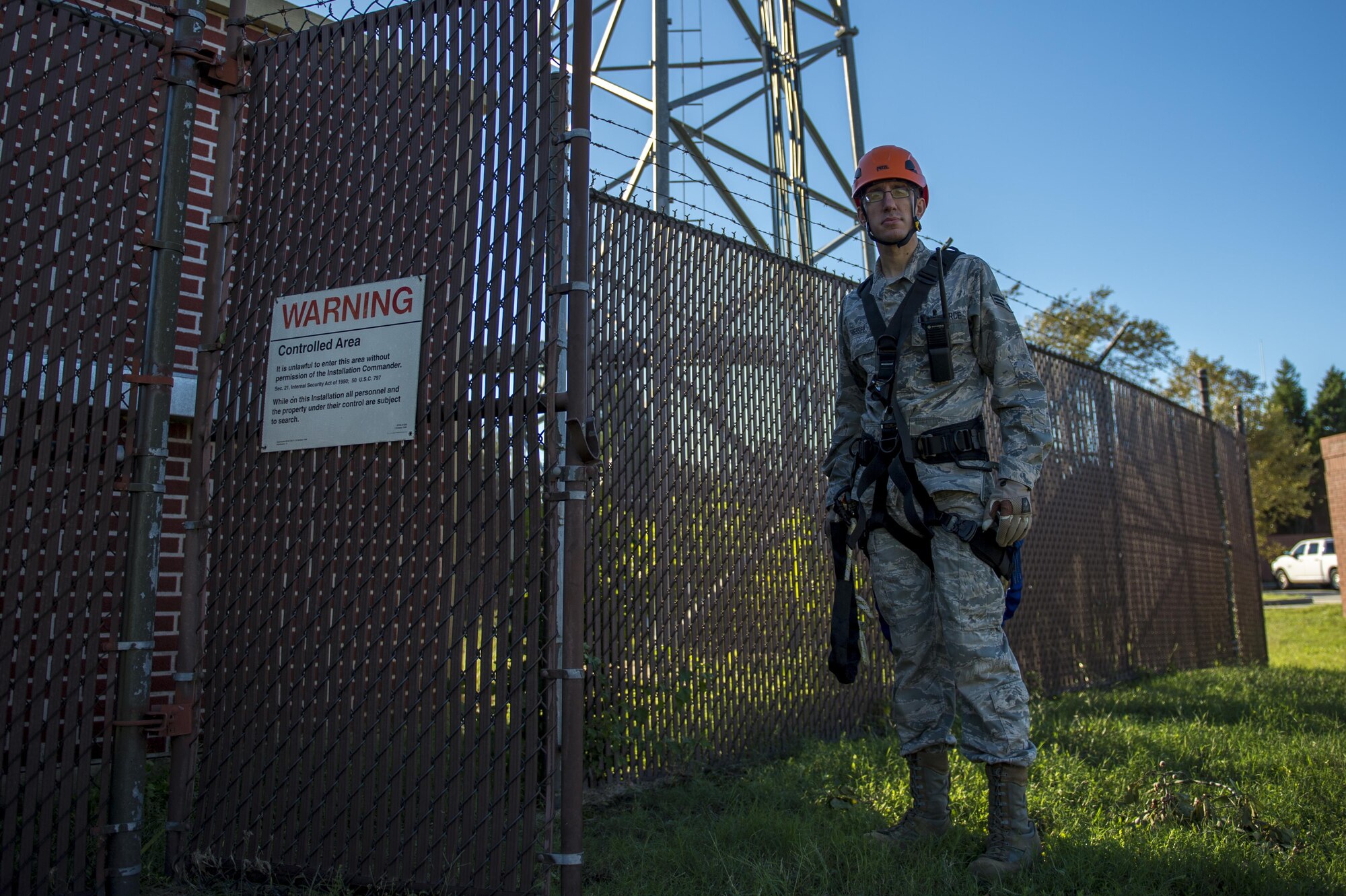 U.S. Air Force Senior Airman Anthony Tressel, radio frequency transmission technician with the 628th Communications Squadron, inspects a ultra high frequency (UHF) antenna for wind damage caused by Hurricane Matthew  on Joint Base Charleston, S.C., Oct. 10, 2016. Joint Base personnel are working diligently to return the Joint Base to full operational status after disaster response coordinators assessed damage and verified a safe operating environment. 