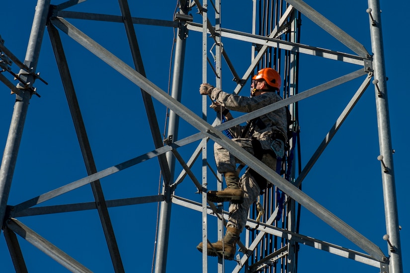 U.S. Air Force Senior Airman Anthony Tressel, radio frequency transmission technician with the 628th Communications Squadron, inspects a ultra high frequency (UHF) antenna for wind damage caused by Hurricane Matthew  on Joint Base Charleston, S.C., Oct. 10, 2016. Joint Base personnel are working diligently to return the Joint Base to full operational status after disaster response coordinators assessed damage and verified a safe operating environment. 