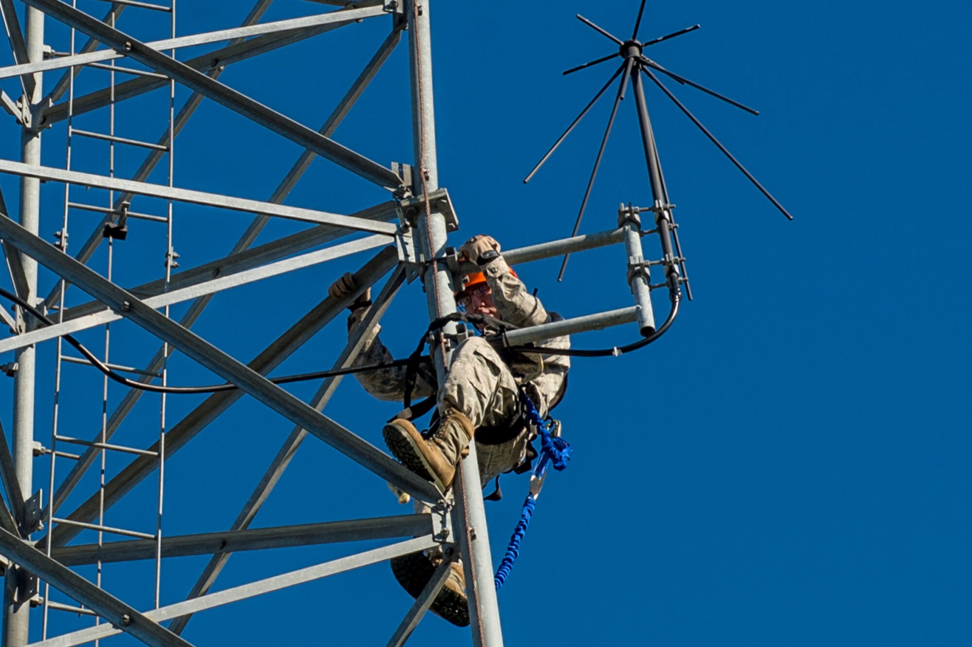 U.S. Air Force Senior Airman Anthony Tressel, radio frequency transmission technician with the 628th Communications Squadron, inspects a ultra high frequency (UHF) antenna for wind damage caused by Hurricane Matthew  on Joint Base Charleston, S.C., Oct. 10, 2016. Joint Base personnel are working diligently to return the Joint Base to full operational status after disaster response coordinators assessed damage and verified a safe operating environment.