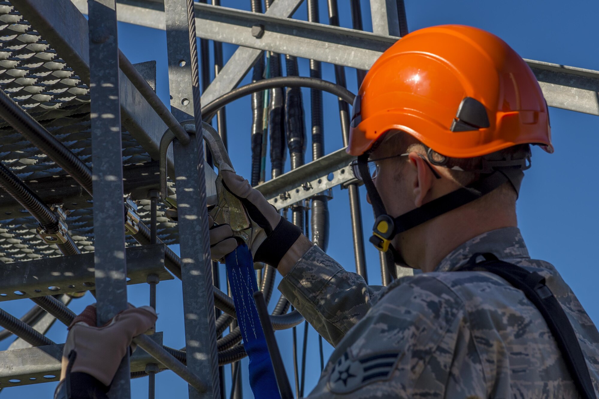 U.S. Air Force Senior Airman Anthony Tressel, radio frequency transmission technician with the 628th Communications Squadron, inspects a ultra high frequency (UHF) antenna for wind damage caused by Hurricane Matthew  on Joint Base Charleston, S.C., Oct. 10, 2016. Joint Base personnel are working diligently to return the Joint Base to full operational status after disaster response coordinators assessed damage and verified a safe operating environment.