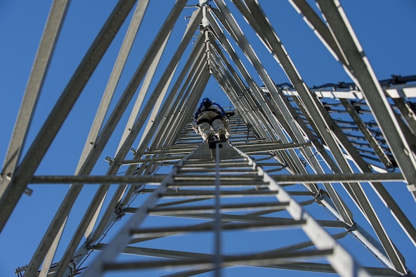 U.S. Air Force Senior Airman Anthony Tressel, radio frequency transmission technician with the 628th Communications Squadron, inspects a ultra high frequency (UHF) antenna for wind damage caused by Hurricane Matthew  on Joint Base Charleston, S.C., Oct. 10, 2016. Joint Base personnel are working diligently to return the Joint Base to full operational status after disaster response coordinators assessed damage and verified a safe operating environment. 