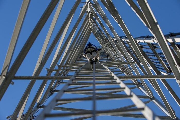U.S. Air Force Senior Airman Anthony Tressel, radio frequency transmission technician with the 628th Communications Squadron, inspects a ultra high frequency (UHF) antenna for wind damage caused by Hurricane Matthew  on Joint Base Charleston, S.C., Oct. 10, 2016. Joint Base personnel are working diligently to return the Joint Base to full operational status after disaster response coordinators assessed damage and verified a safe operating environment. 