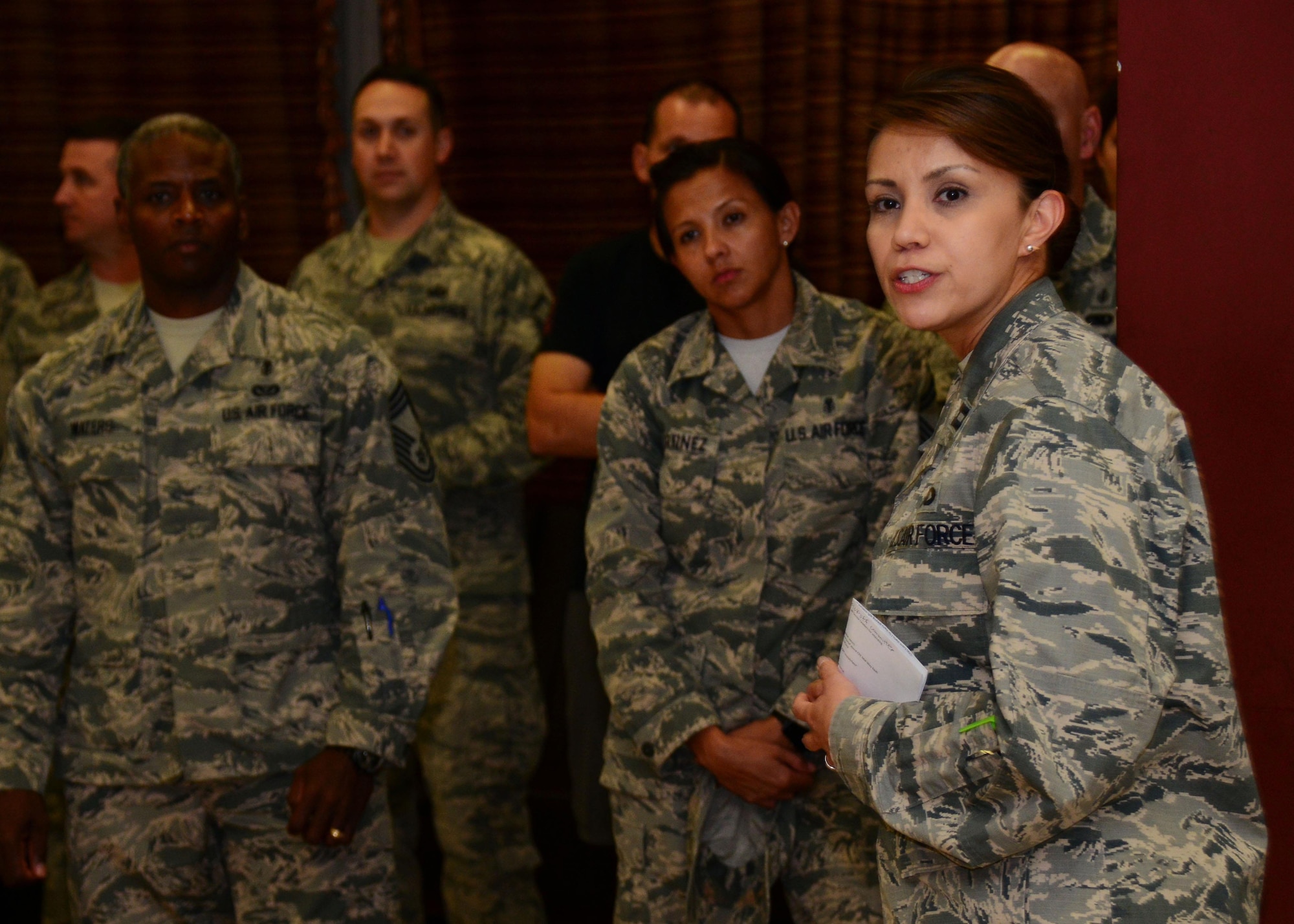 Capt. Melissa Gonzalez, 379th Air Expeditionary Wing Combined Federal Campaign community and area project officer, speaks during the CFC kickoff Oct. 6, 2016, at Al Udeid Air Base, Qatar. The CFC is a federal  program that makes donating to charities and organizations easier by allowing individuals to donate through a database online. (U.S Air Force photo/Senior Airman Miles A. Wilson/Released)