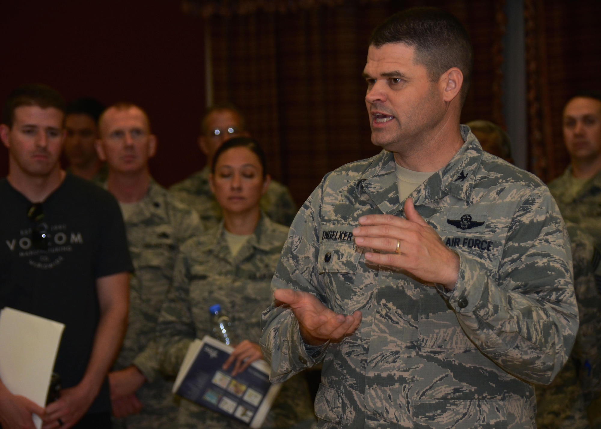 Col. Jeffrey P. Engelker, 379th Air Expeditionary Wing vice commander, speaks to unit leaders about the importance and benefits of the Combined Federal Campaign Oct. 6, 2016, at Al Udeid Air Base, Qatar. The CFC program is a tool that allows Airmen to donate to charities and causes online, or through automatic payments. Each unit within the wing has representatives to help in the distribution of information regarding the program. (U.S. Air Force photo/Senior Airman Miles A. Wilson/Released)
