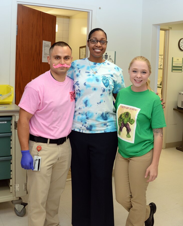 Naval Branch Health Clinic-Albany Sailors and civilian personnel trade in traditional uniforms to team up with fellow clinic staff to participate in teambuilding activities, recently. The “friendly competition,” which lasted several weeks, was strategically implemented to improve patient care and to increase morale between civilians and corpsmen stationed aboard Marine Corps Logistics Base Albany.