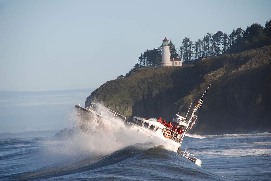 USCG Motor Lifeboat 47213 conducting surf operations near the treacherous Columbia River Bar, Washington.  The 47-foot Motor Life Boat is primarily designed as a fast-response rescue vessel for high-seas, surf, and heavy weather environments. (U.S. Coast Guard Photo by Petty Officer 1st Class Jamie Thielen)