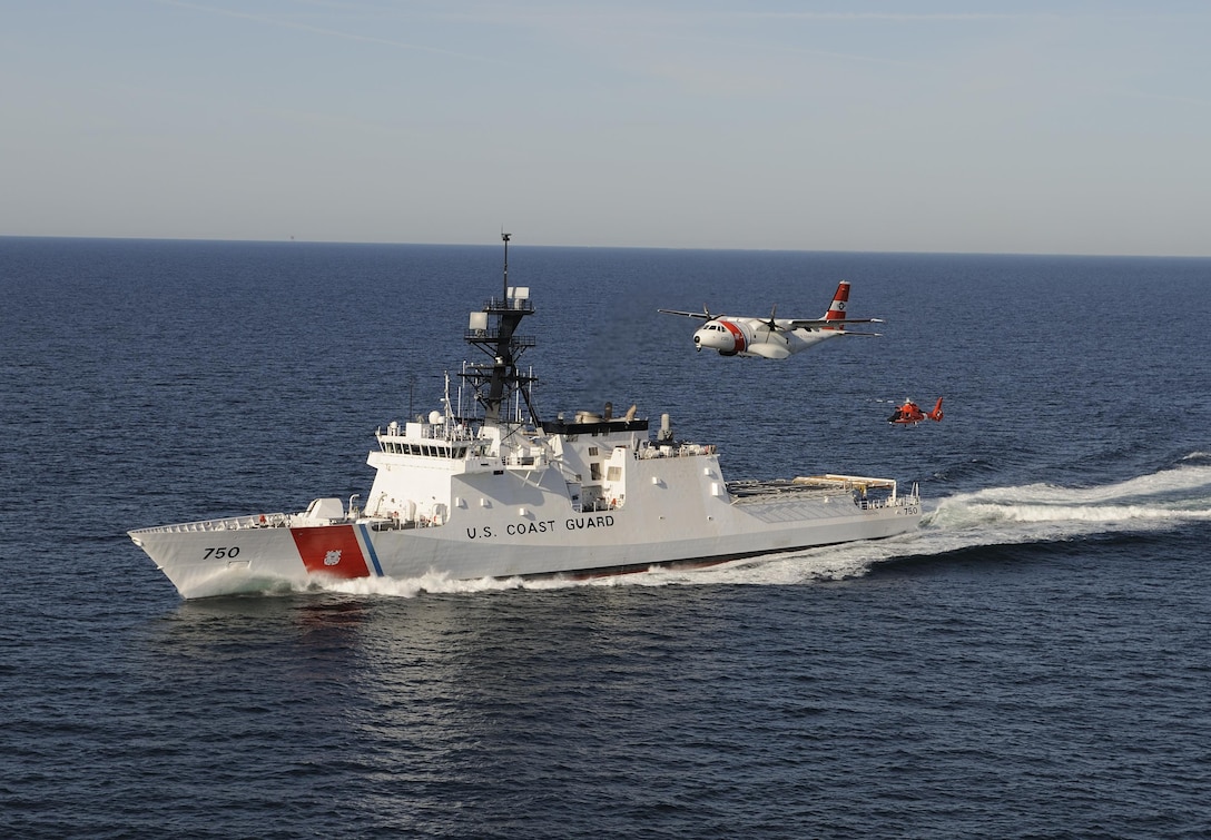 The U. S. Coast Guard's first national security cutter, the Bertholf, operating in concert an HC-144 maritime patrol aircraft and an MH-65 helicopter. The flagship in the Coast Guard's first new class of large cutters in 25 years, Bertholf is the Coast Guard's largest ever patrol cutter. (U.S. Coast Guard photo by PAC Tom Sperduto)