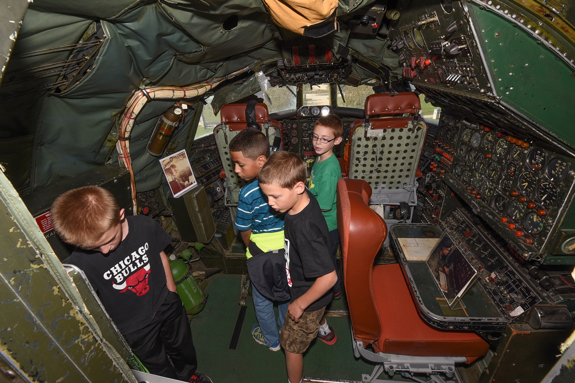 PETERSON AIR FORCE BASE, Colo. – A group of children from the STARBASE Academy investigate the cockpit of an EC-121T Warning Star aircraft display at the Peterson Air and Space Museum on Peterson Air Force Base, Colo., Oct. 4, 2016. The EC-121T Warning Star is the museum’s centerpiece, located on the east side of the airpark. (U.S. Air Force photo by Philip Carter) 