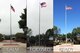 U.S. Air Force photo illustration of the Air Base flagpole with the torn flag on the day of the hurricane.