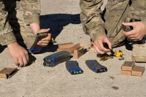 Airmen from the 791st Missile Security Forces Squadron load ammunition into magazines during training at Minot Air Force Base, N.D., Sept. 28, 2016. Response force members are trained to recapture and protect resources after being seized by opposing forces. (U.S. Air Force photo/Airman 1st Class Jessica Weissman)