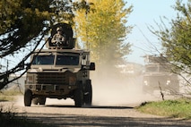 Staff Sgt. Jonathan Spencer, 791st Missile Security Forces Squadron response force member, rides in the turret of a Bearcat during training at Minot Air Force Base, N.D., Sept. 28, 2016. Response force members protect and deny access to vehicles transporting resources to and from Minot AFB. (U.S. Air Force photo/Airman 1st Class Jessica Weissman)