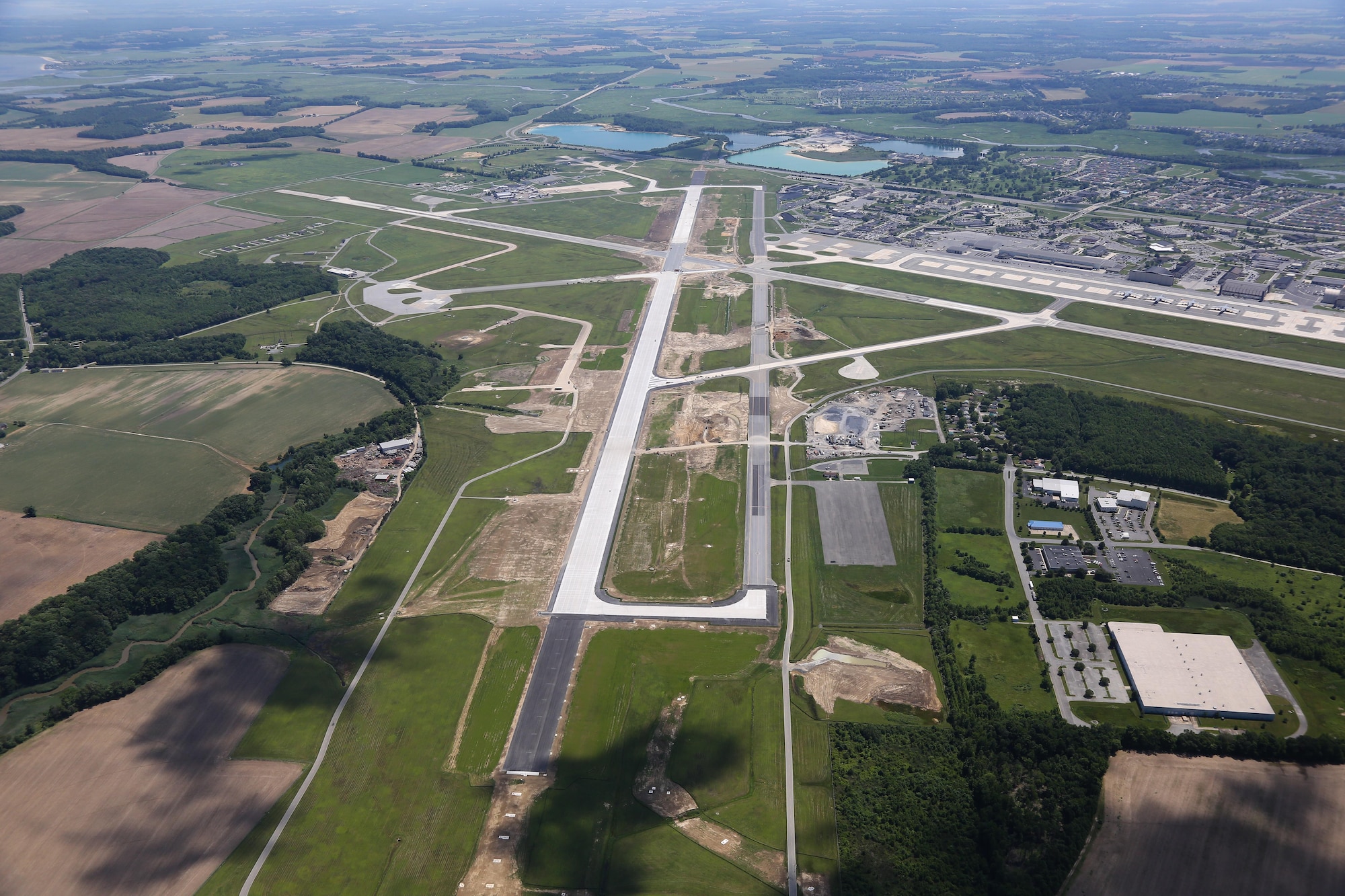 Runway 01-19 at Dover AFB, Delaware, is 9,600 feet long and 200 feet wide. The renovation, which lasted almost two years, includes 220,000 cubic yards of concrete; 1,040 lighting fixtures; and 209 miles of cable. 
