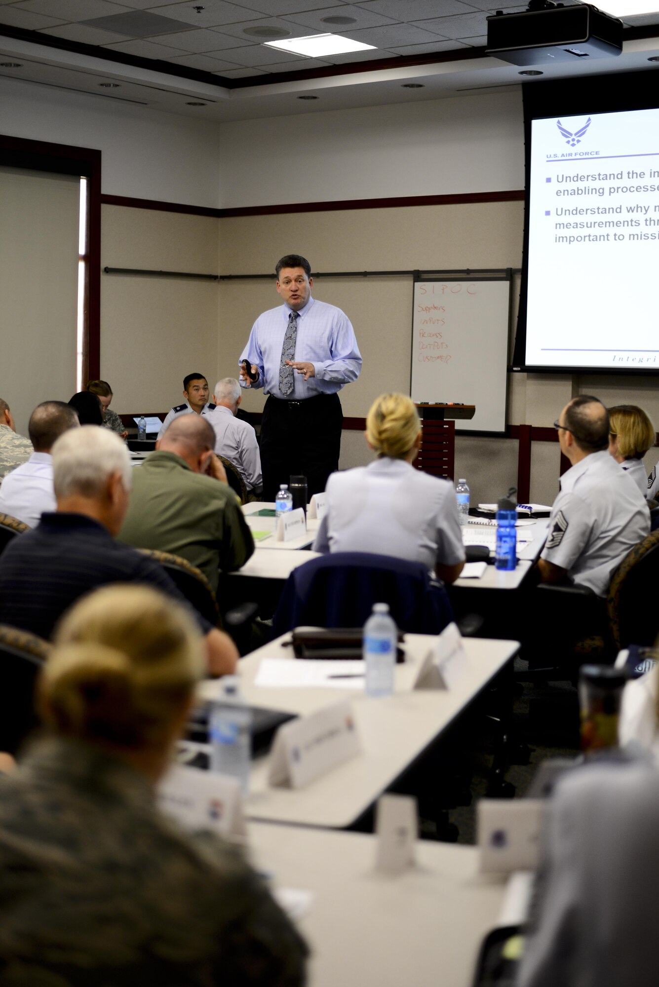 Dr. Phil Chansler, faculty instructor with Air Education and Training Command, Maxwell Air Force Base (AFB), Ala., teaches Continuous Process Improvement concepts to MacDill AFB, Fla., senior leaders at the Davis Conference Center, Sept. 30, 2016. Colonels, General Schedule (GS)-14s (or equivalent), chief master sergeants and squadron commanders were among the 41 personnel in attendance. (U.S. Air Force photo by Staff Sgt. Melanie Hutto)