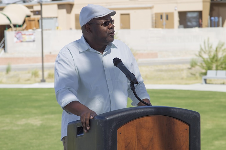 Melvin Pickens, lead facilities management specialist, Public Works Division, speaks to ceremony attendees during the Victory Park ribbon-cutting ceremony aboard Marine Corps Air Ground Combat Center, Twentynine Palms, Calif., Oct. 5, 2016. (Official Marine Corps photo by Cpl. Connor Hancock/Released)