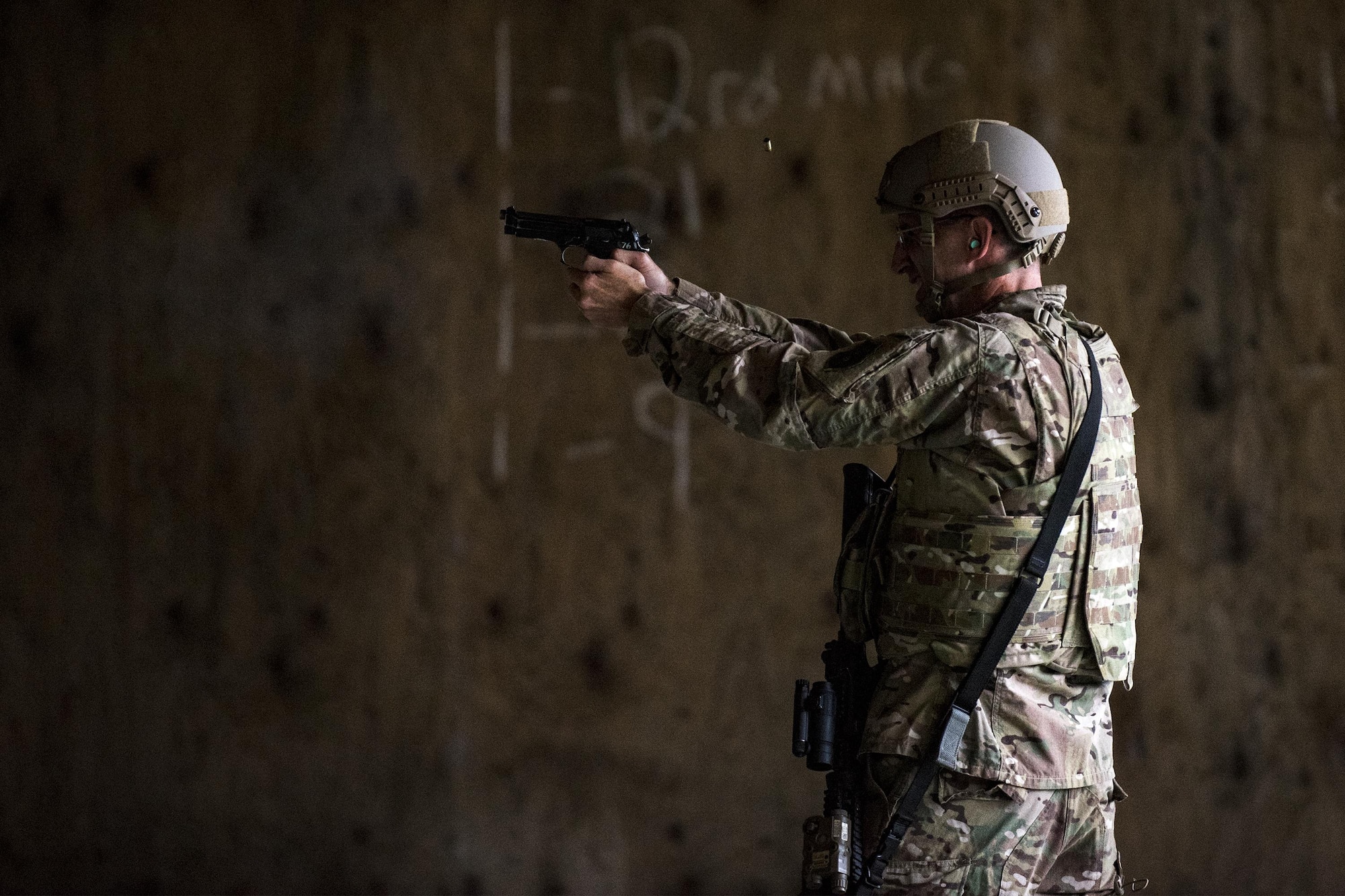 U.S. Air Force Maj. Gen. Scott Zobrist, 9th Air Force commander, fires an M9 pistol, Oct. 6, 2016, at Moody Air Force Base, Ga. As the 9th Air Force commander, Zobrist is responsible for ensuring combat support capabilities from eight wings and three direct reporting units, consisting of more than 400 aircraft and 29,000 active-duty Airmen and civilians. This was Zobrist’s first official visit to the 93rd Air Ground Operations Wing since taking command in May 2016. He was accompanied by Chief Master Sgt. Frank H. Batten III, 9th Air Force command chief. (U.S. Air Force photo by Airman 1st Class Daniel Snider)