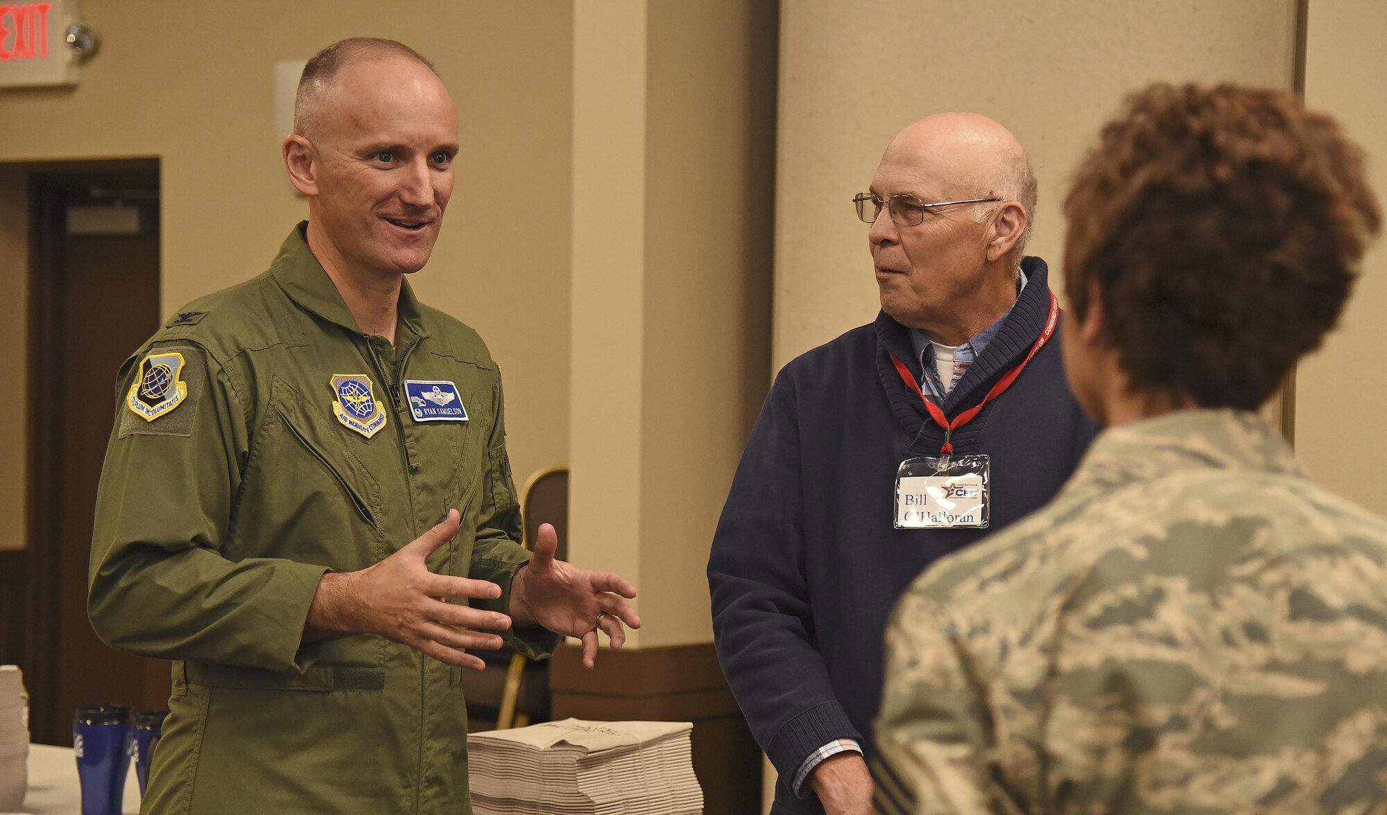 Col. Ryan Samuelson, 92nd Air Refueling Wing commander, discusses the Combined Federal Campaign with Bill O’Halloran, CFC local coordinator, and Chief Master Sgt. Shannon Rix, 92nd ARW command chief, during the CFC Charity Fair Oct. 7, 2016, at the Red Morgan Center. In 2015, Fairchild raised more than $92,500 for national and local charities. (U.S. Air Force photo/Senior Airman Mackenzie Richardson