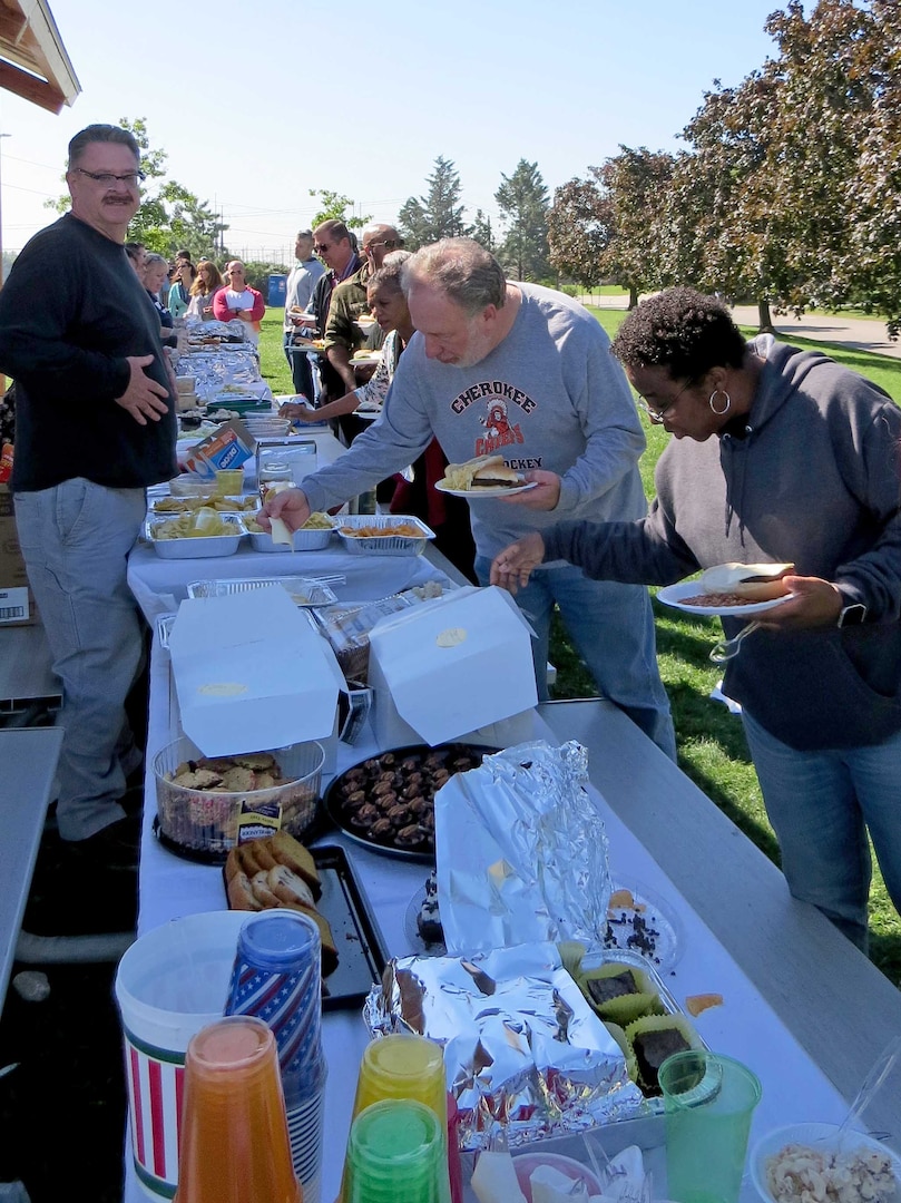 Subsistence employees enjoy a picnic lunch Oct. 5 at the NSA Philadelphia base pavilion during a Fall Fling event. Employees also played cornhole, horseshoes and "Family Food." 