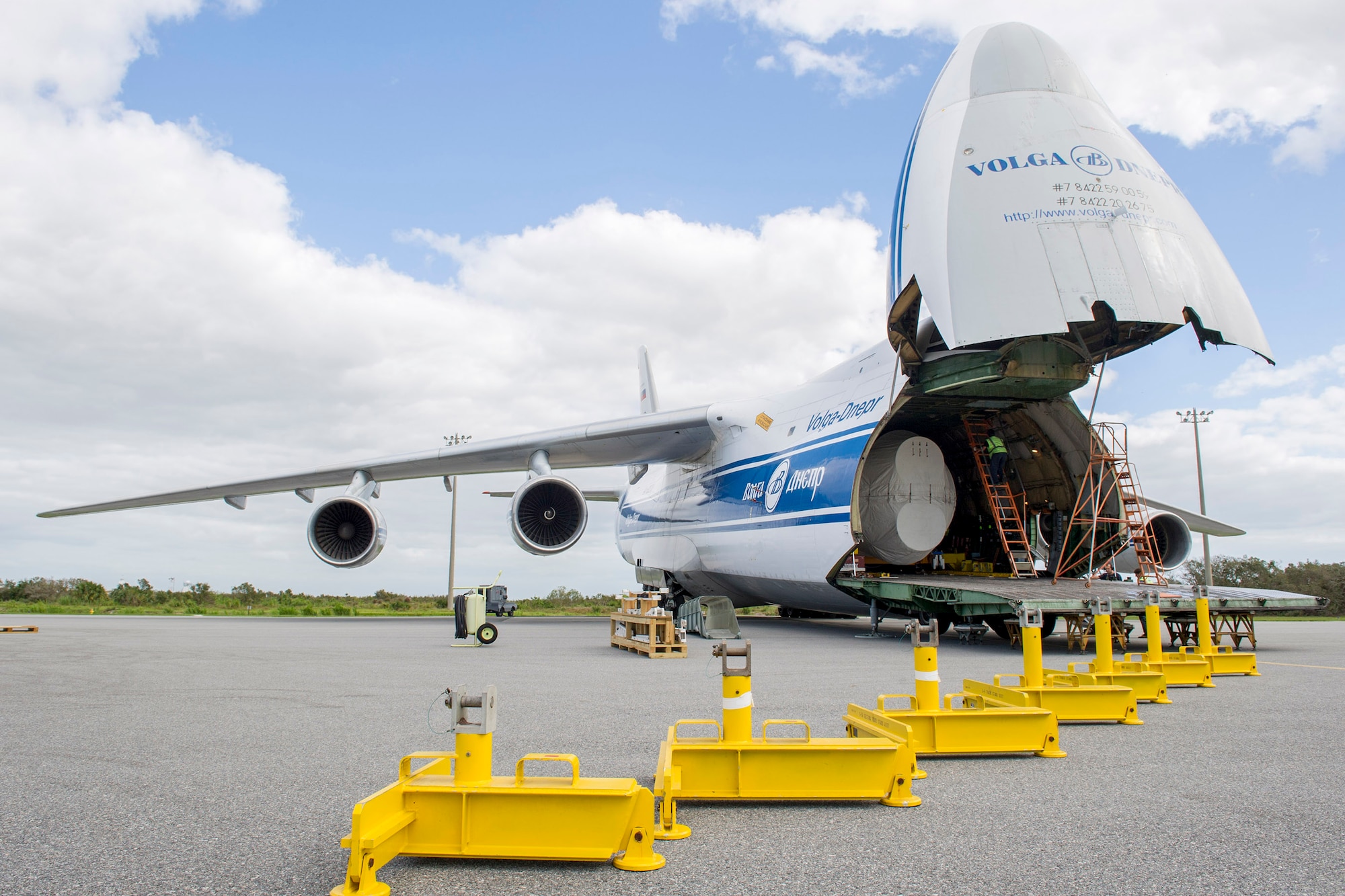 Members of the 45th Space Wing offload a United Launch Alliance Atlas V booster from an Antonov aircraft Oct. 10, 2016. The aircraft safely landed on the Skid Strip on Oct. 9, 2016, at Cape Canaveral Air Force Station, Fla., while the base was in recovery operations after Hurricane Matthew. The successful delivery Oct. 9 not only ensured the capability to proceed with the upcoming GOES-R (Geosynchronous Operational Environmental Satellite) mission, it also demonstrated the wing's return to full mission capability after CCAFS closed Oct. 6 in an effort to keep personnel and the installation safe during the Category 3 storm. (U.S. Air Force photos/Matthew Jurgens)