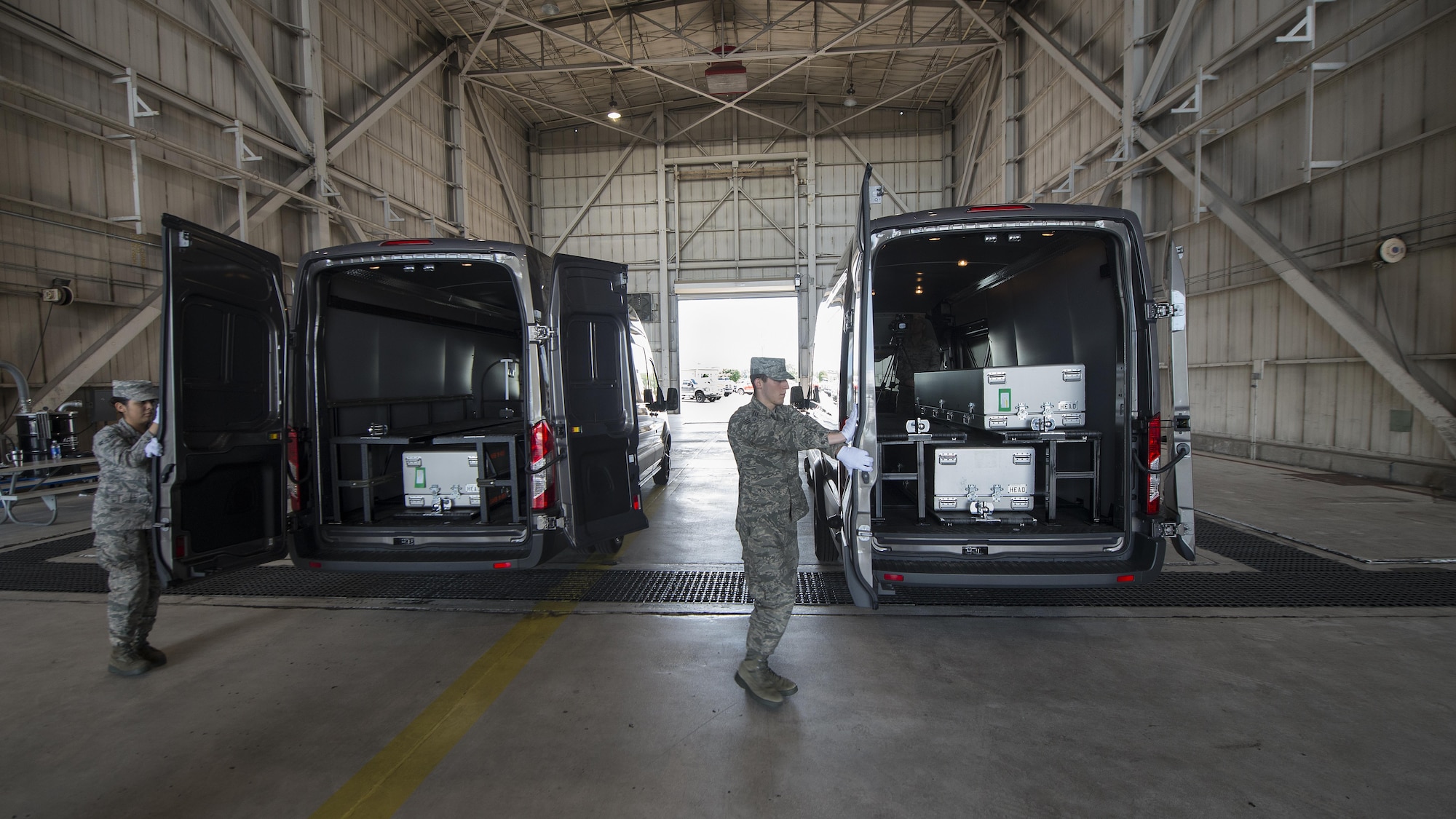 Transfer vehicle doors are closed during an inside dignified transfer exercise Aug. 28, 2016, at Dover Air Force Base, Del. Each transfer vehicle is designed to carry three transfer cases. (U.S. Air Force photo by Senior Airman Zachary Cacicia)