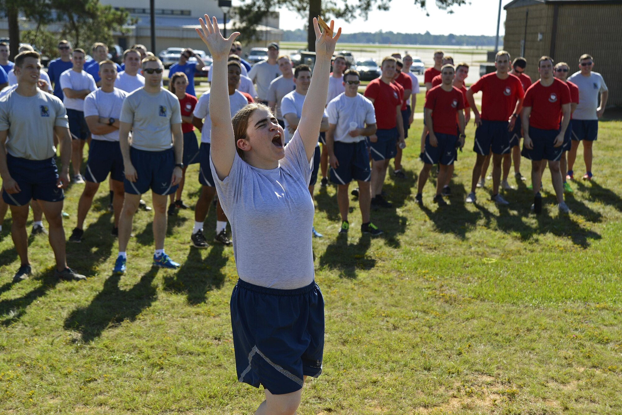 U.S. Air Force Senior Airman Jamie Mihalko, 20th Operations Support Squadron administrator, cheers after winning a prize during the 20th Operations Group Olympics at Shaw Air Force Base, S.C., Sept. 30, 2016. Airmen who performed the best in each event, as well as teams who accumulated the most points, won prizes at the end of the day. (U.S. Air Force photo by Airman BrieAnna Stillman) 