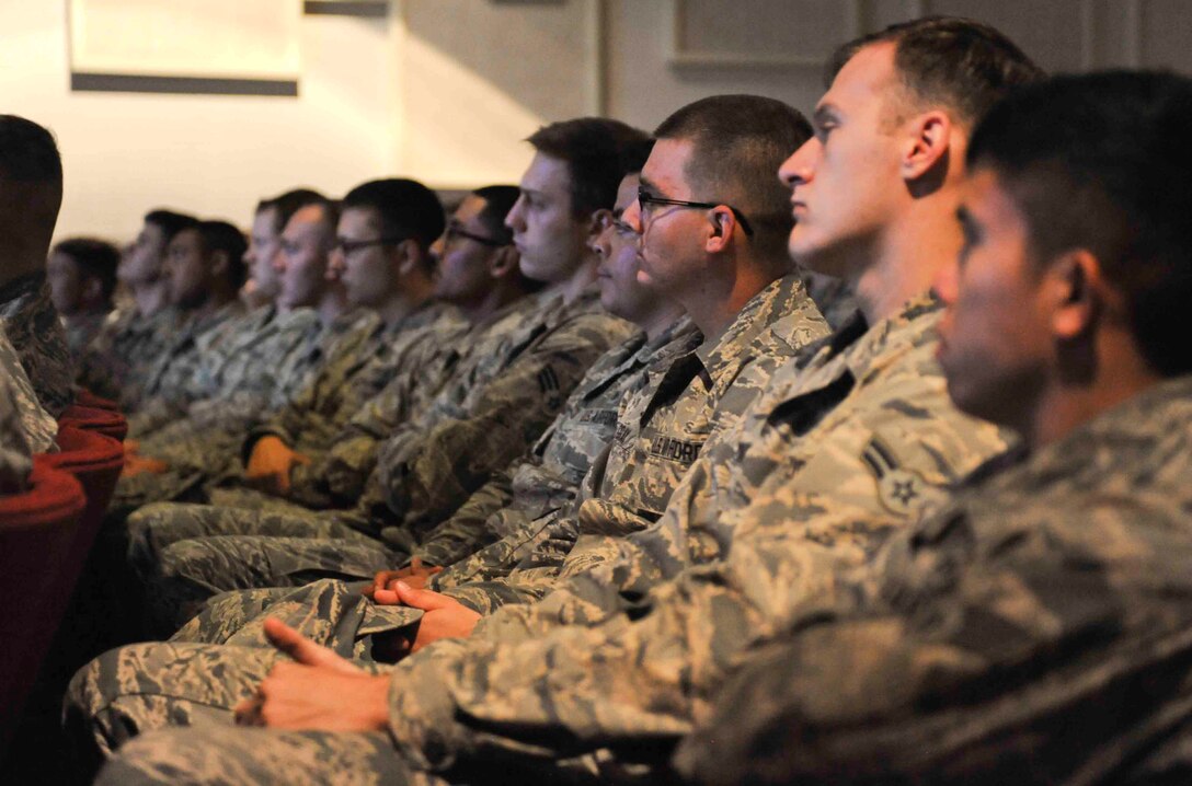 Junior-enlisted Airmen listen to Chief Master Sgt. Sonia Lee, command chief of the 28th Bomb Wing, during an enlisted call inside the base theater at Ellsworth Air Force Base, S.D., October 3, 2016. Lee spoke about the challenges Airmen face as well as the Air Force’s new retirement options, Ellsworth’s SafeRide program and winter preparation. (U.S. Air Force photo by Airman 1st Class Randahl J. Jenson)