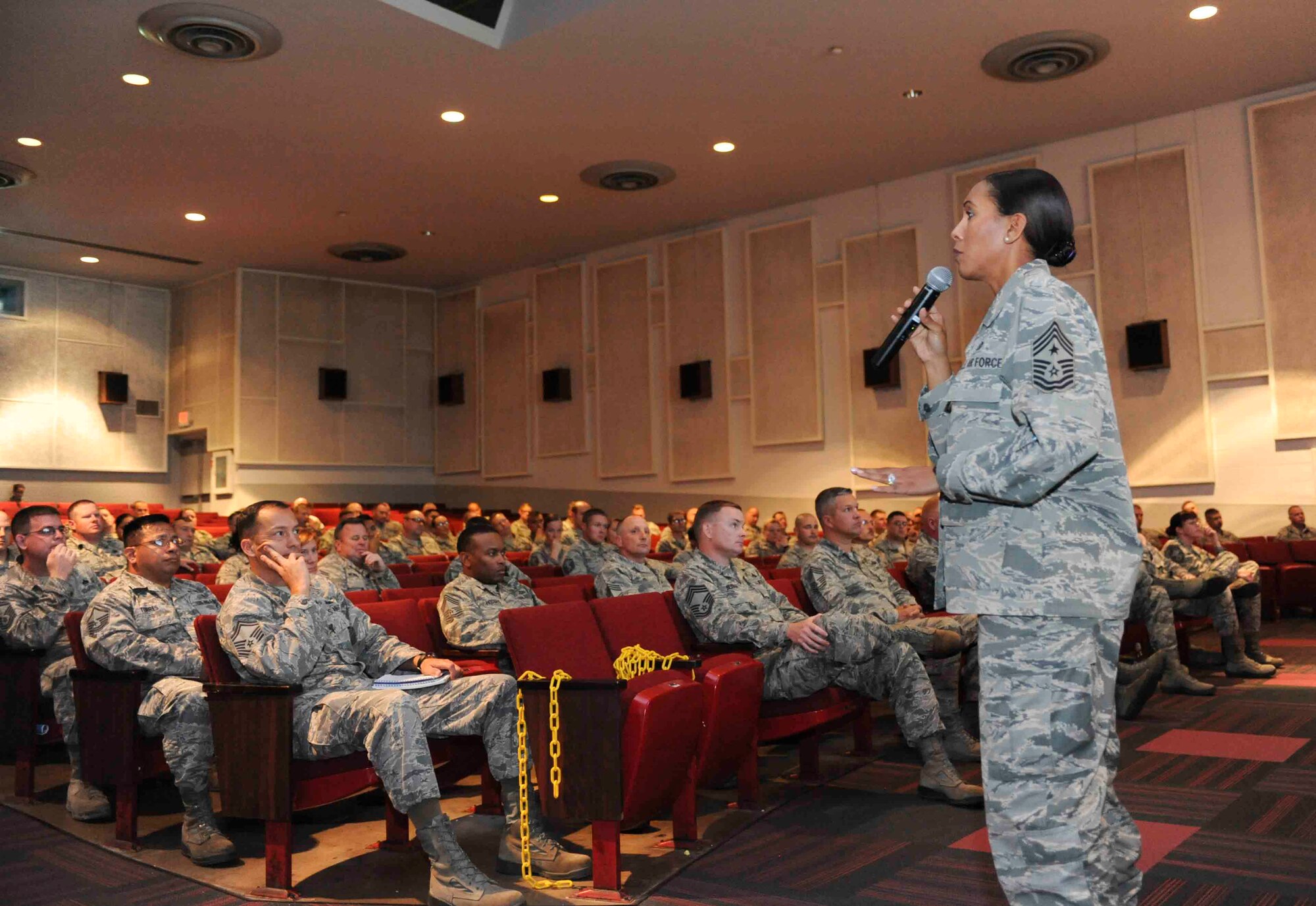 Chief Master Sgt. Sonia Lee, command chief of the 28th Bomb Wing, addresses Ellsworth’s senior noncommissioned officers during an enlisted call inside the base theater at Ellsworth Air Force Base, S.D., October 3, 2016. The enlisted calls allowed for Lee to address Airmen, noncommissioned officers and senior NCO’s separately, and discuss the unique challenges each tier faces. (U.S. Air Force photo by Airman 1st Class Randahl J. Jenson)    