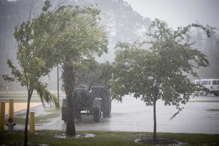 Heavy rains and winds beat on heavy equipment aboard Marine Corps Air Station Beaufort Oct. 7. As Hurricane Matthew passes through Florida, MCAS Beaufort prepares for recovery efforts if needed. 