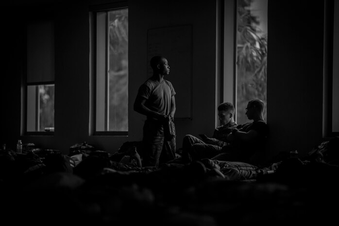 Marines and sailors await for instructions as Hurricane Matthew passes aboard Marine Corps Air Station Beaufort Oct. 8. Marines and sailors with MCAS Beaufort worked to remove debris and establish infrastructure aboard the air station and Laurel Bay after Hurricane Matthew. The Marines and sailors are with MCAS Beaufort. 