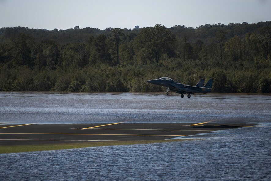 An F-15E Strike Eagle from the 336th Fighter Squadron lands on the runway, Oct. 11, 2016, at Seymour Johnson Air Force Base, North Carolina. More than 40 Strike Eagles were repositioned to Barksdale Air Force Base, Louisiana, ahead of Hurricane Matthew to avoid potential damage from severe weather associated with the storm. (U.S. Air Force photo by Senior Airman Brittain Crolley)