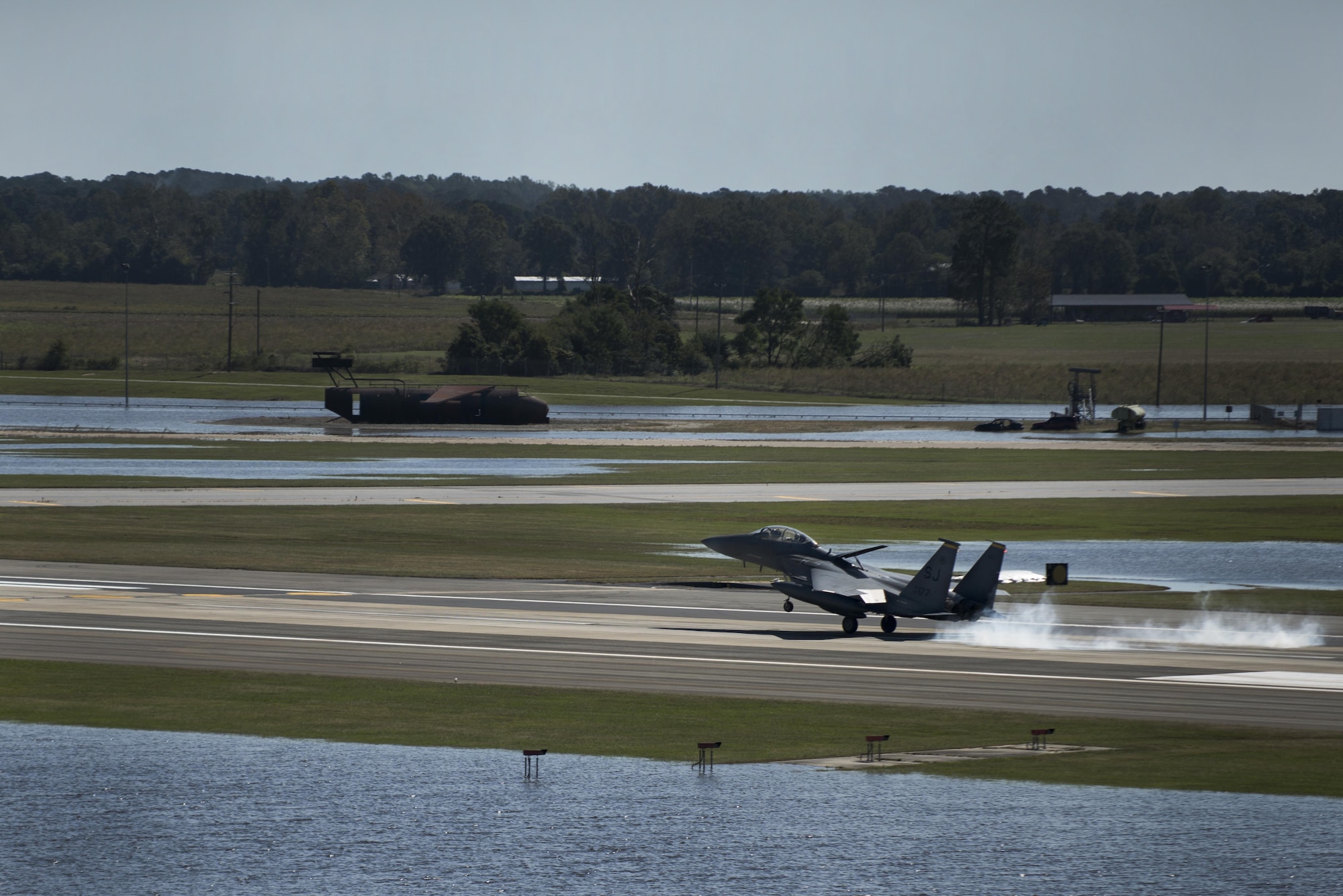 An F-15E Strike Eagle from the 336th Fighter Squadron lands on the runway, Oct. 11, 2016, at Seymour Johnson Air Force Base, North Carolina. More than 40 Strike Eagles were repositioned to Barksdale Air Force Base, Louisiana, ahead of Hurricane Matthew to avoid potential damage from severe weather associated with the storm. (U.S. Air Force photo by Senior Airman Brittain Crolley)