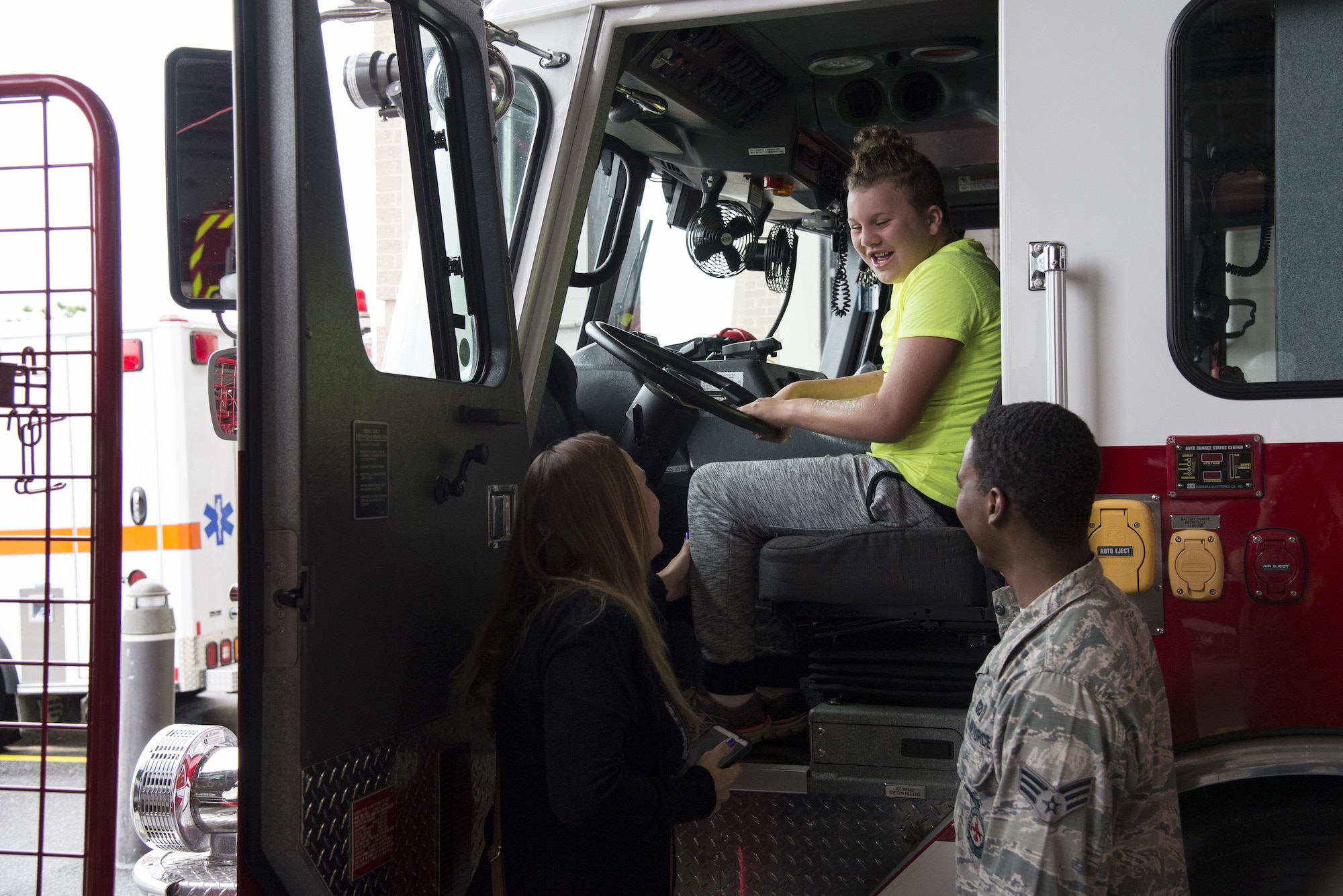 Haydee Hunt, daughter of Adam Hunt, 436th Maintenance Squadron Isochronal Maintenance Dock chief, sits in a fire truck assigned to the 436th Civil Engineer Squadron Fire Department during the Dover Air Force Base First Responders’ Special Needs Day Oct. 8, 2016, at the 436th CES Fire Department on Dover AFB, Del. The event partnered with the Exceptional Family Member Program to allow Team Dover’s special needs members an opportunity to become comfortable with first responders in a controlled setting. (U.S. Air Force photo by Senior Airman Aaron J. Jenne)