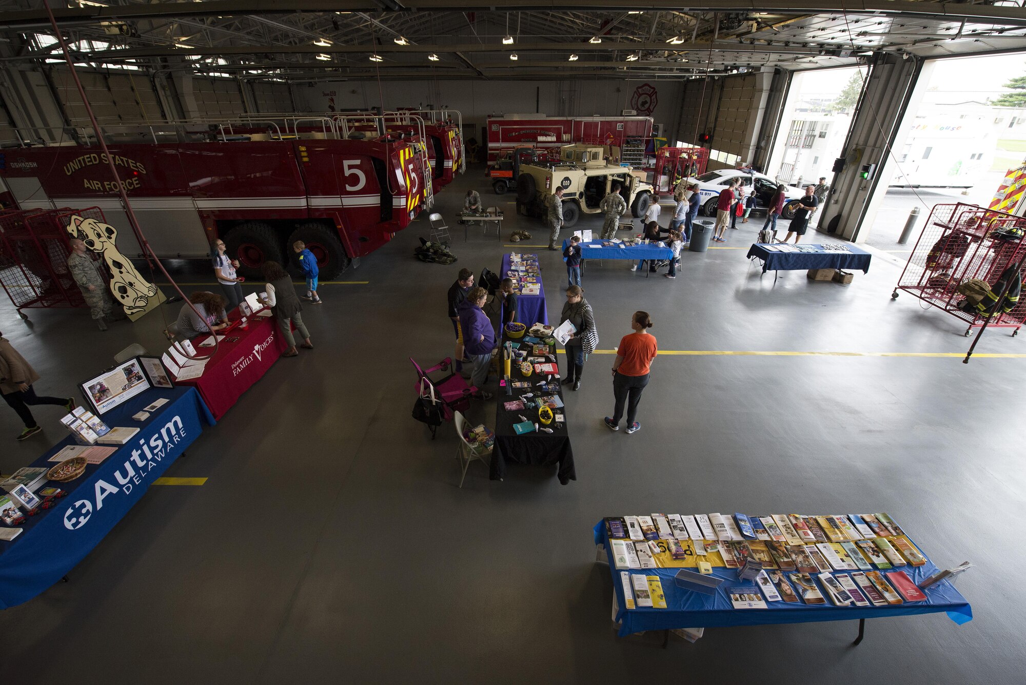 Attendees of the Dover Air Force Base First Responders’ Special Needs Day interact with representatives from the Exceptional Family Member Program, the School Liaison office and Team Dover first responders Oct. 8, 2016, at the 436th Civil Engineer Squadron Fire Department on Dover AFB, Del. The event intended to provide a calm setting for EFMP families to interact with first responders. (U.S. Air Force photo by Senior Airman Aaron J. Jenne)