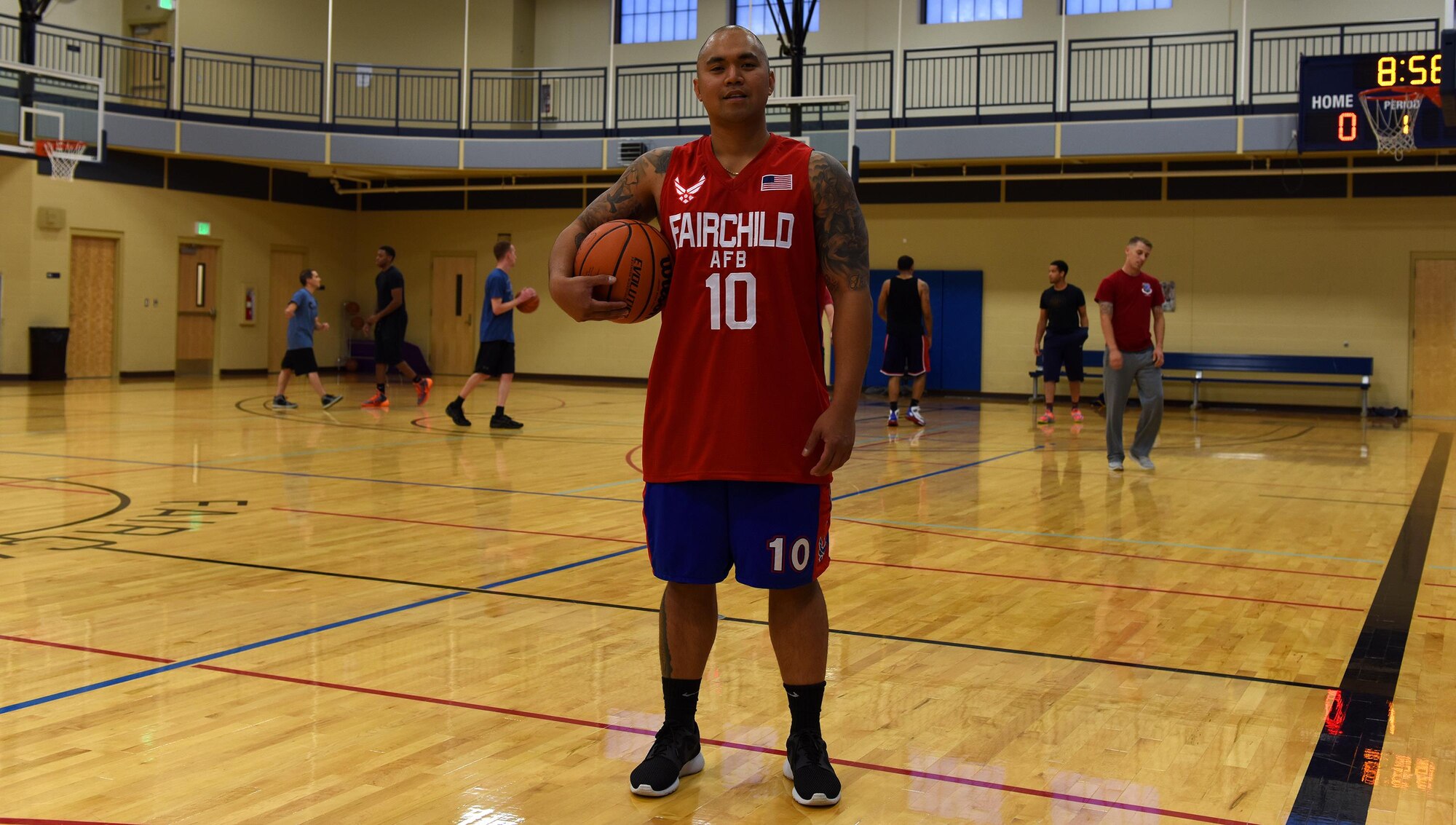 Staff Sgt. Jan Michael G Obiniana, 92nd Force Support Squadron sports program manager, pauses mid-game to pose for a photo Oct. 7, 2016, at Fairchild Air Force Base, Wash. Helping to keep Airmen fit to fight, Obiniana supports base sports teams and provides everything they need to play. The 92nd FSS leadership choose him to be one of Fairchild’s Finest, a weekly recognition program that highlights top-performing Airmen. (U.S. Air Force photo/Airman 1st Class Ryan Lackey)