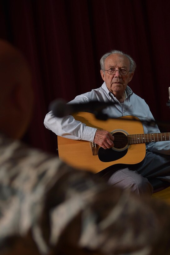 Bobby Wheeler, a veteran in the music therapy program at Salem Veteran Affairs Medical Center, watches as U.S. Air Force Tech. Sgt Jason Cale, U.S. Air Force Heritage of America Band, Blue Aces NCO in charge, guides him through a few chords on the guitar, at the Salem VA Medical Center in Salem, Va., Sept. 27, 2016. During the one-on-one sessions with the veterans, band member’s assisted and encouraged the musicians. Wheeler is one of many veterans who have improved his memory, and other things while being a part of the music therapy program. (U.S. Air Force photo by Senior Airman Kimberly Nagle) 