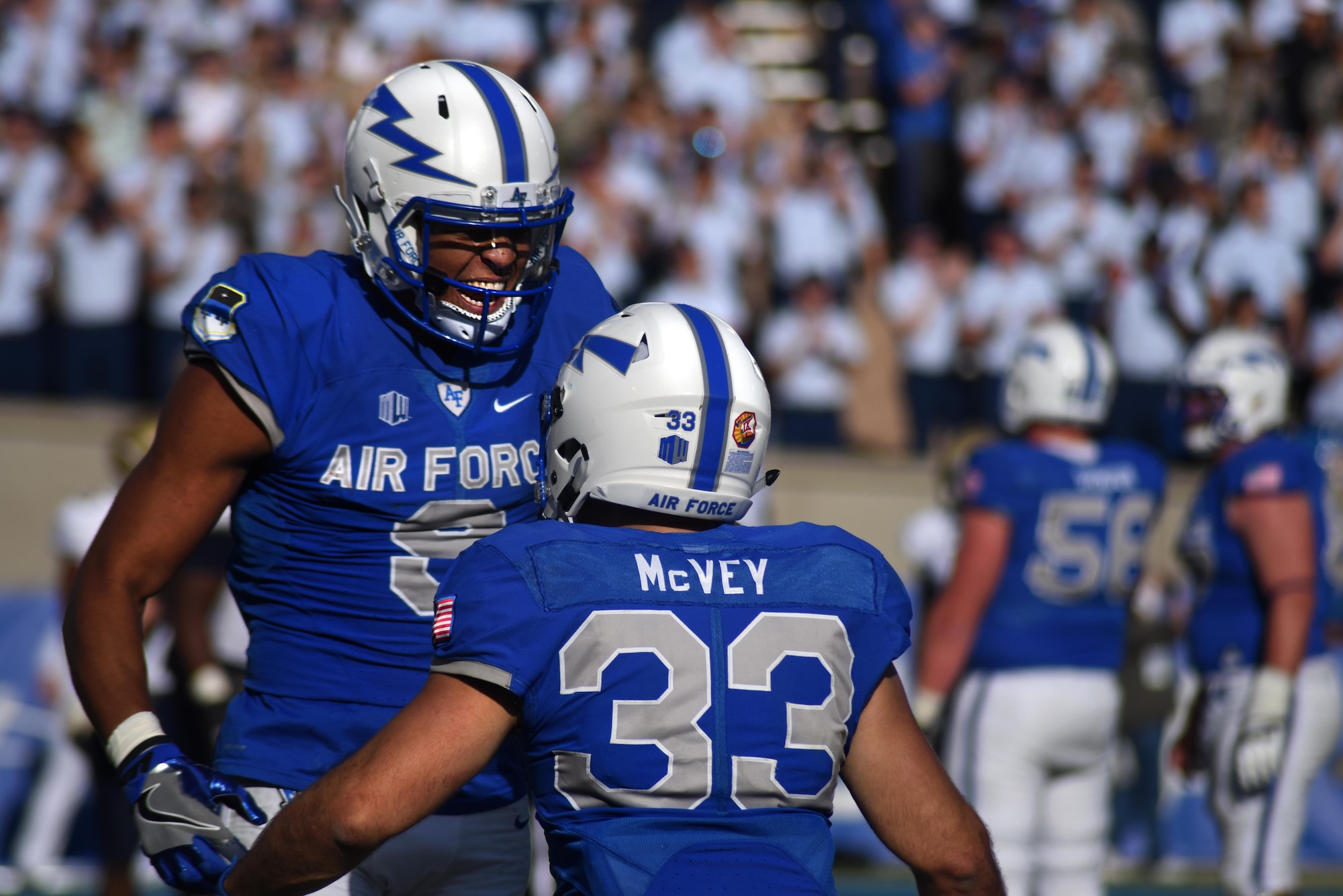 U.S. AIR FORCE ACADEMY, Colo. – Cadet 1st Class Jalen Robinette, U.S. Air Force Academy football team wide receiver, reacts to a touchdown by Cadet 2nd Class Tim McVey, USAFA football team running back, during the Air Force vs. Navy game in Falcon Stadium at the U.S. Air Force Academy, Colo., Oct. 1, 2016. This was the first in a 49-game series where both teams were undefeated moving into the fourth game of the season. (U.S. Air Force photo by Airman 1st Class Dennis Hoffman)