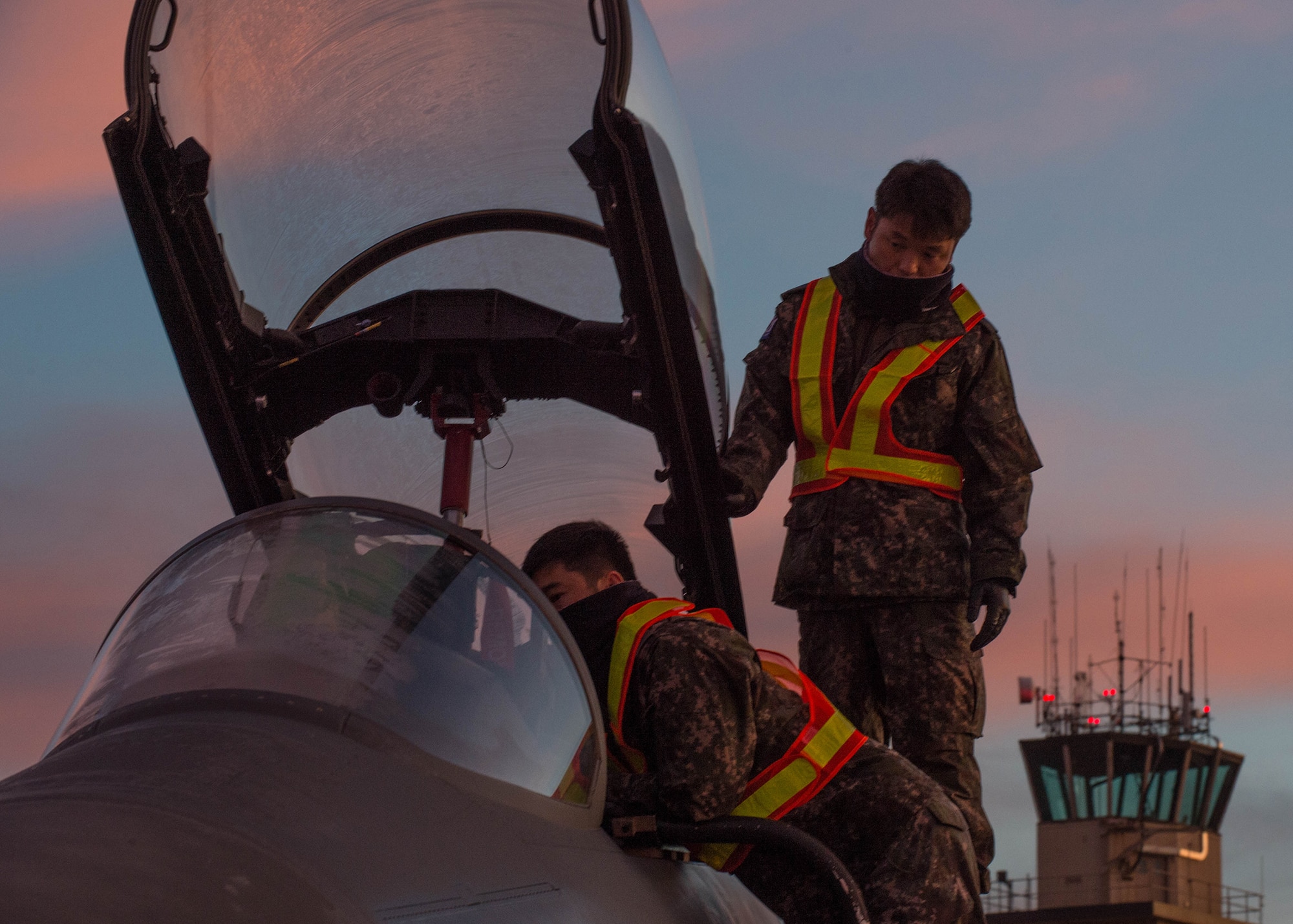 Maintenance airmen with the Republic of Korea Air Force conduct last minute function checks on an F-15K Slam Eagle fighter aircraft prior to a flight Oct. 11, 2016, during RED FLAG-Alaska (RF-A) 17-1 at Eielson Air Force Base, Alaska. RF-A is a Pacific Air Forces commander-directed field training exercise for U.S. and partner forces, enabling joint and international units to exchange tactics, techniques, and procedures while improving interoperability in a realistic threat environment. (U.S. Air Force photo by Staff Sgt. Shawn Nickel)