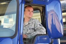 Staff Sgt. Ryan Ernst, 4th Space Operations Squadron mobile flight shelter maintainer, maneuvers the Advanced Ground Mobile onto the ramp of a C-17 Globemaster III. The 4 SOPS mobile team requires space operators with a Commercial Driver’s License to be able to transport the mobile assets. (U.S. Air Force photo/2nd Lt. Darren Domingo)