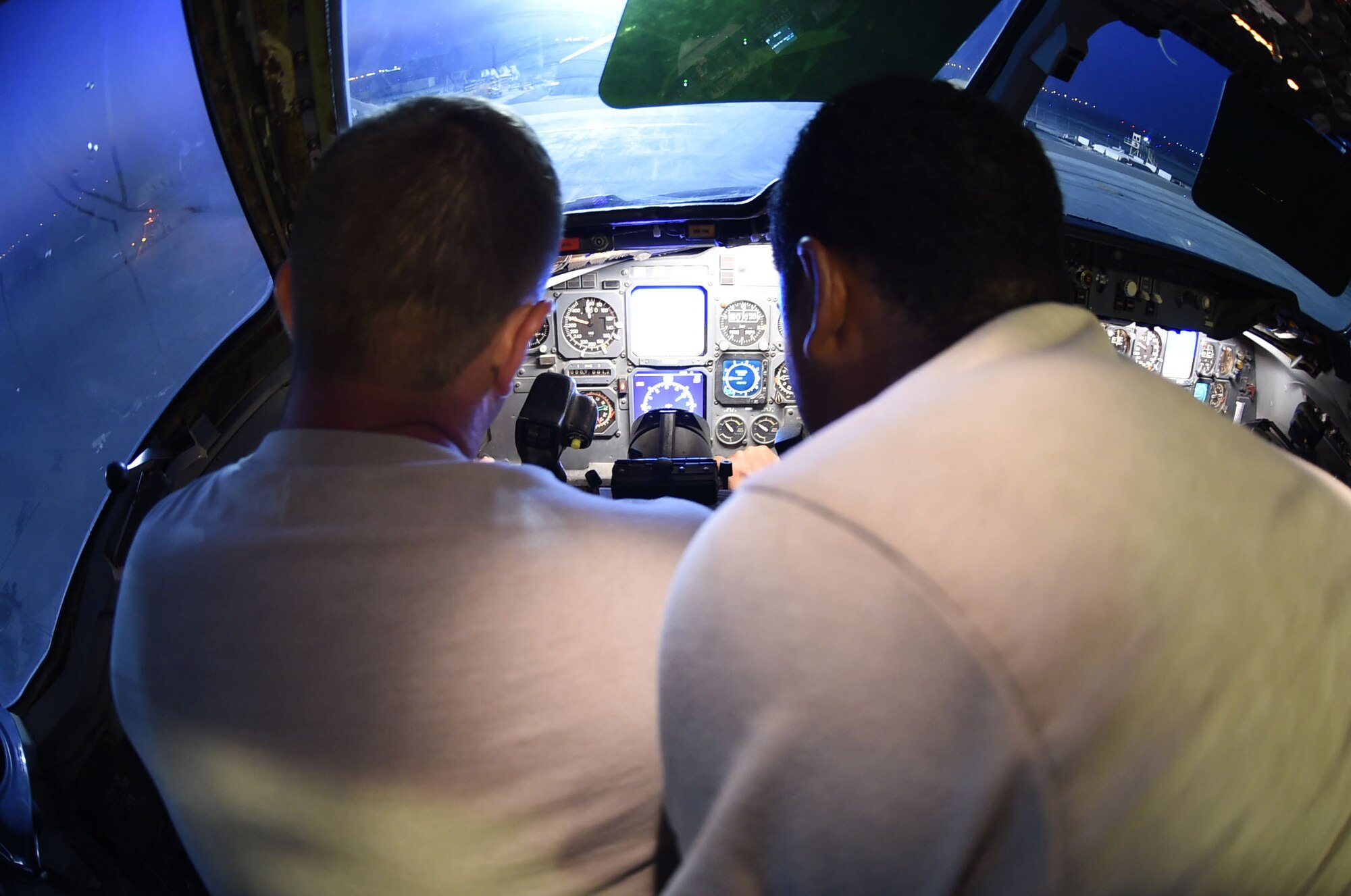 Maintainers from the 380th Expeditionary Aircraft Maintenance Squadron check over a KC-10 Extender control panel at an undisclosed location in Southwest Asia, Oct. 9, 2016. Maintenance crews are essential to the Air Force mission by working day and night in austere conditions to ensure that aircraft are functional and safe. (U.S. Air Force photo by Tech. Sgt. Christopher Carwile)