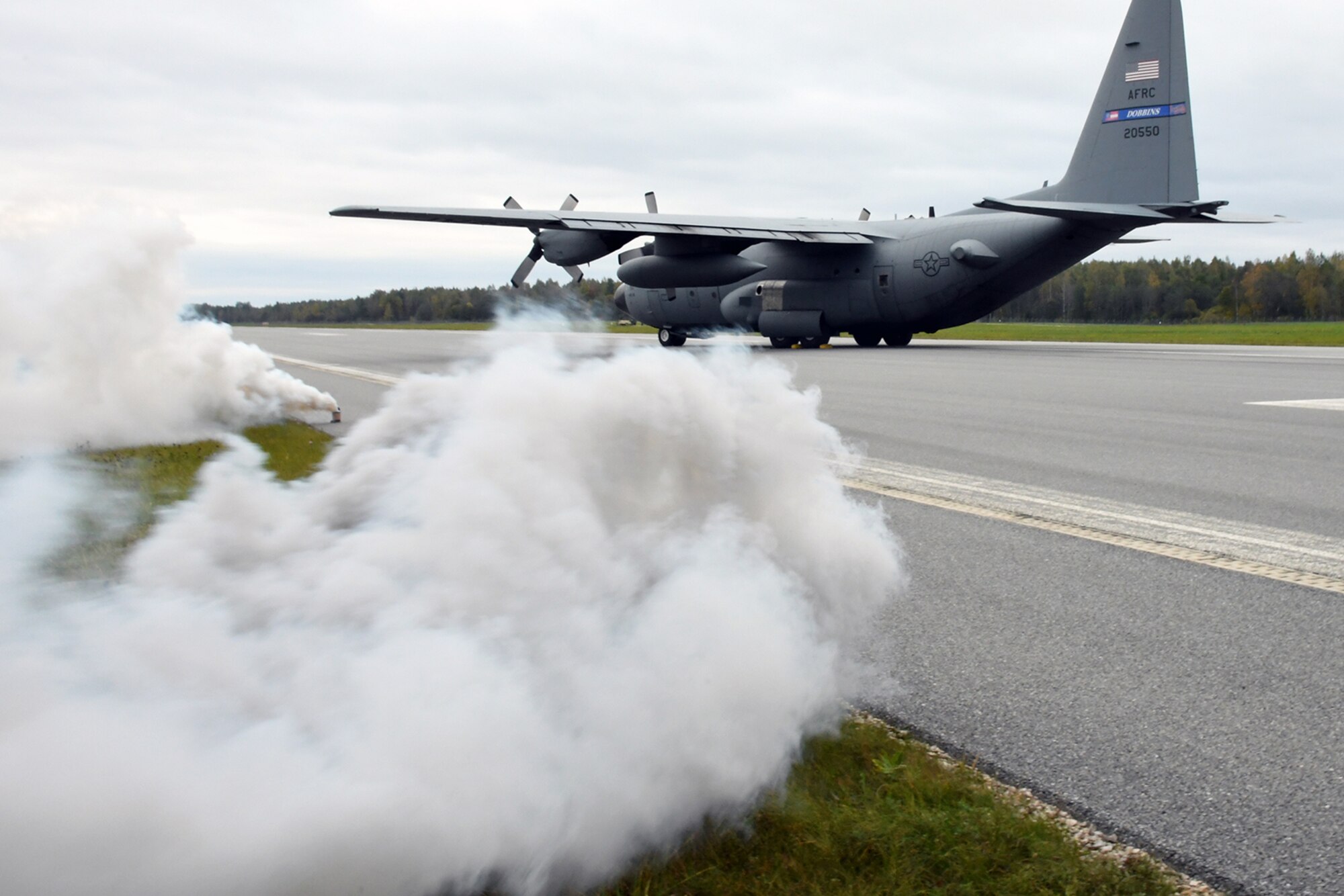 A C-130H from the 94th Airlift Wing, Dobbins Air Reserve Base, Ga., is positioned on the runway in a simulated crash at Lielvarde Air Base, Latvia, during Sky Fist, Oct. 6, 2016. Sky Fist was a bilateral aircraft mishap training exercise designed to strengthen the partnership between the U.S. and Latvia. (U.S. Air Force photo by Staff Sgt. Alan Abernethy)